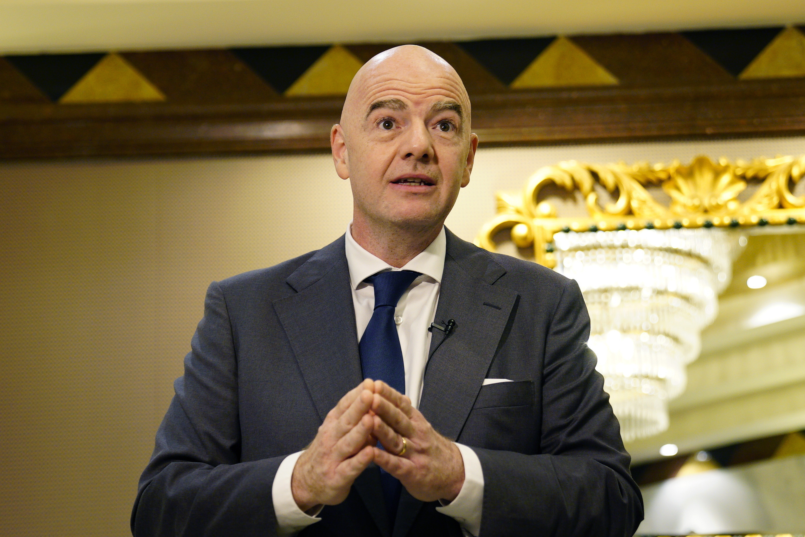 FILE - FIFA President Gianni Infantino speaks during an interview conducted with The Associated Press in Doha, Qatar, March 29, 2022. Infantino said migrant workers gain pride from hard work when he was questioned on Monday, May 2, 2022, about workers suffering in Qatar while building World Cup infrastructure. 