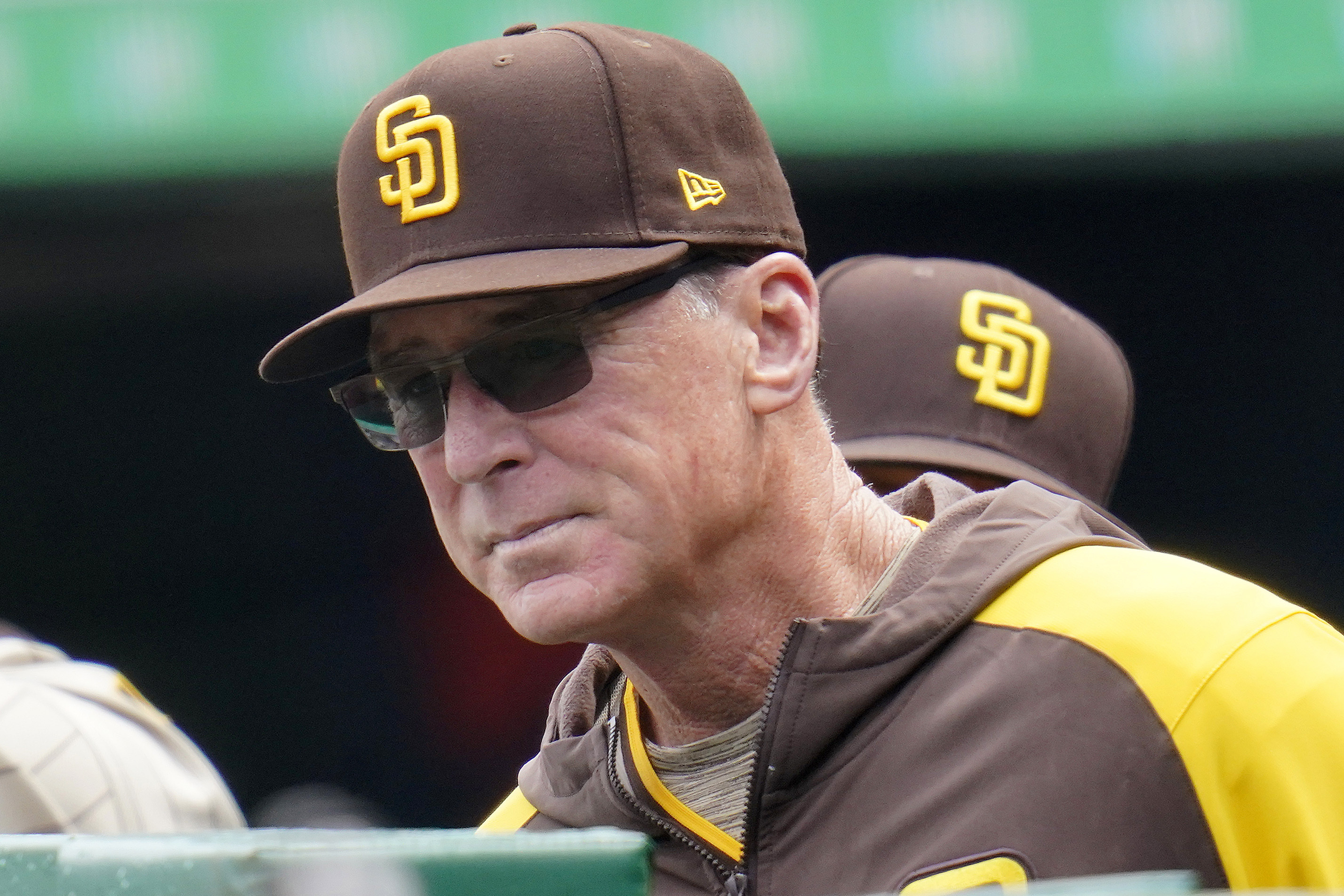 FILE - San Diego Padres manager Bob Melvin stands in the dugout during the first inning of a baseball game against the Pittsburgh Pirates in Pittsburgh, May 1, 2022. Melvin says he'll have prostate surgery on Wednesday, May 11, 2022, and hopes he misses only part of a forthcoming road trip. He doesn't think he has cancer "but they won't know until they get in there." 