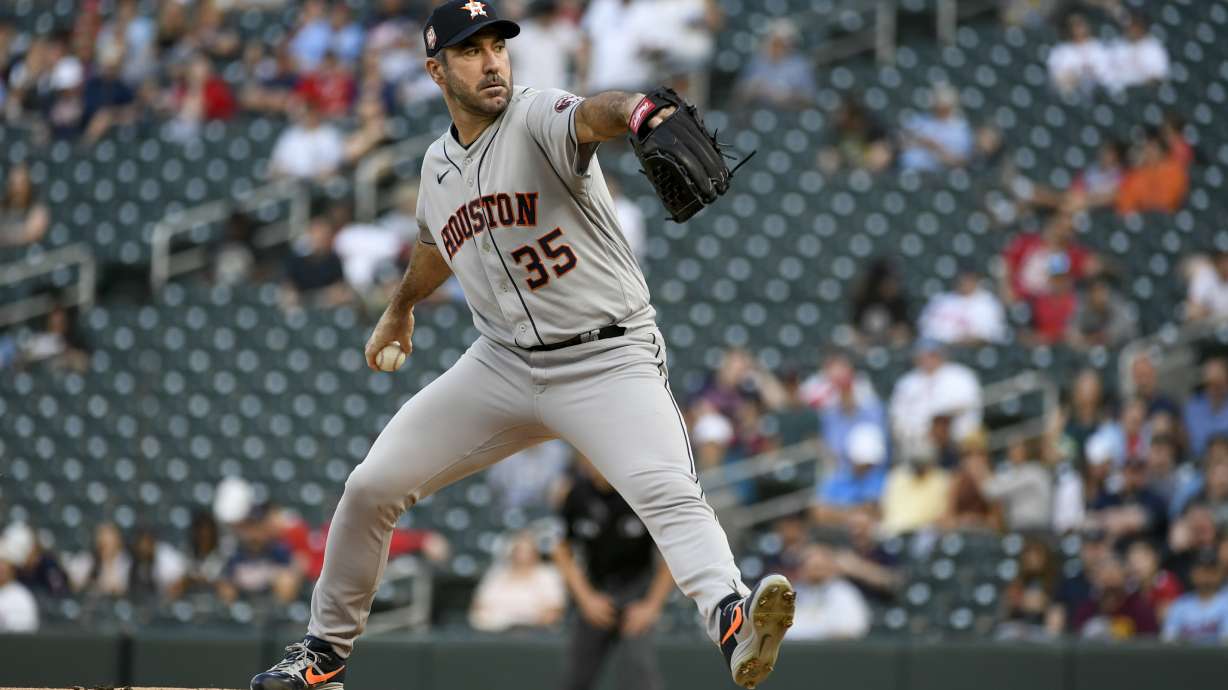 Houston Astros pitcher Justin Verlander throws against the Minnesota Twins during the first inning of a baseball game, Tuesday, May 10, 2022, in Minneapolis.