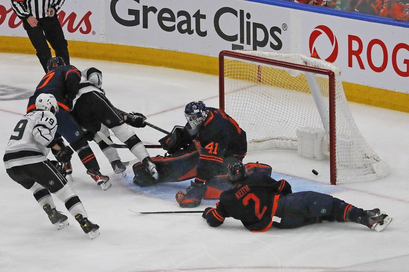 May 10, 2022; Edmonton, Alberta, CAN; Los Angeles Kings forward Adrian Kempe (9) scores the over-time winning gaol against Edmonton Oilers goaltender Mike Smith (41) in game five of the first round of the 2022 Stanley Cup Playoffs at Rogers Place.