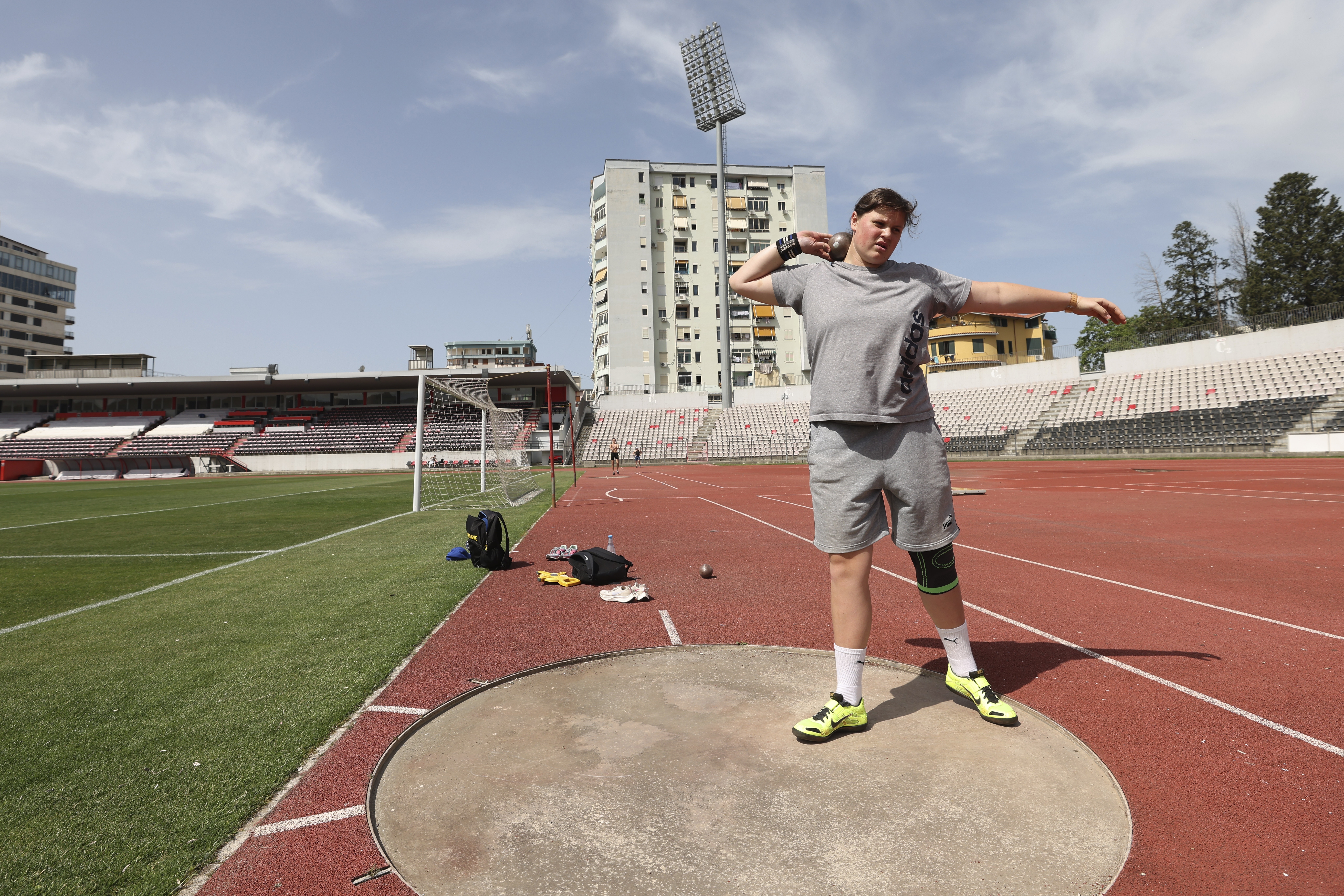 Ukrainian athlete Maria Larina, 17, practices during a training session at Elbasan Arena stadium in Elbasan, about 45 kilometers (30 miles) south of Tirana, Albania, Monday, May 9, 2022. After fleeing from a war zone, a group of young Ukrainian track and field athletes have made their way to safety in Albania. Their minds are still between the two countries. 