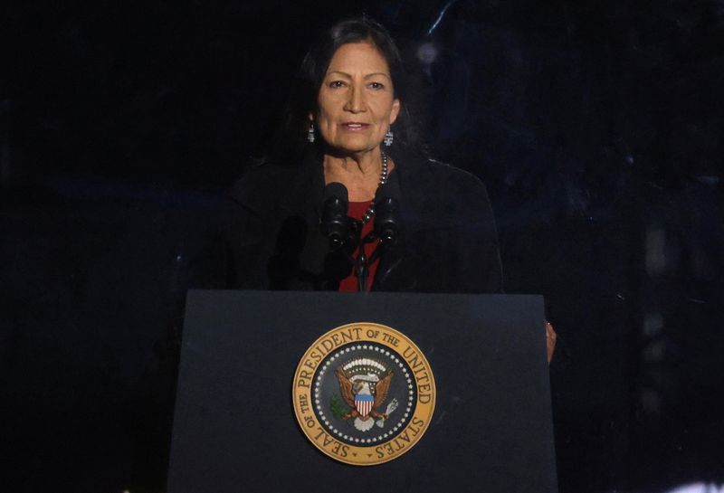 U.S. Secretary of the Interior Deb Haaland speaks near the White House on Dec. 2, 2021. An Interior Department investigation into the dark history of Native American boarding schools in the United States has found "marked or unmarked burial sites" at some 53 schools.