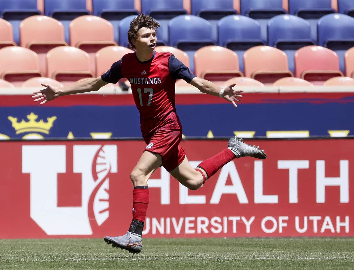 Crimson Cliffs’ Ryan Woolley celebrates his goal against Ridgeline in the 4A boys soccer championship game at Rio Tinto Stadium in Sandy on Wednesday, May 11, 2022.
