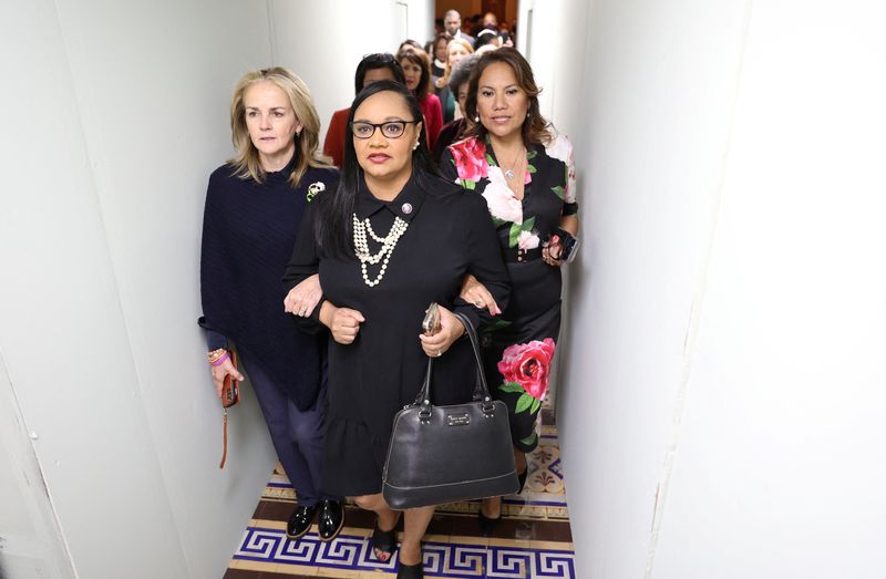 Rep. Madeleine Dean, D-Pa., Rep. Nikema Williams, D-Ga., and Rep. Veronica Escobar, D-Texas, lead a march of Democratic women members of the U.S. House of Representatives through a tunnel in the U.S. Capitol to gather outside of the U.S. Senate chamber to protest and advocate for abortion rights on Wednesday.