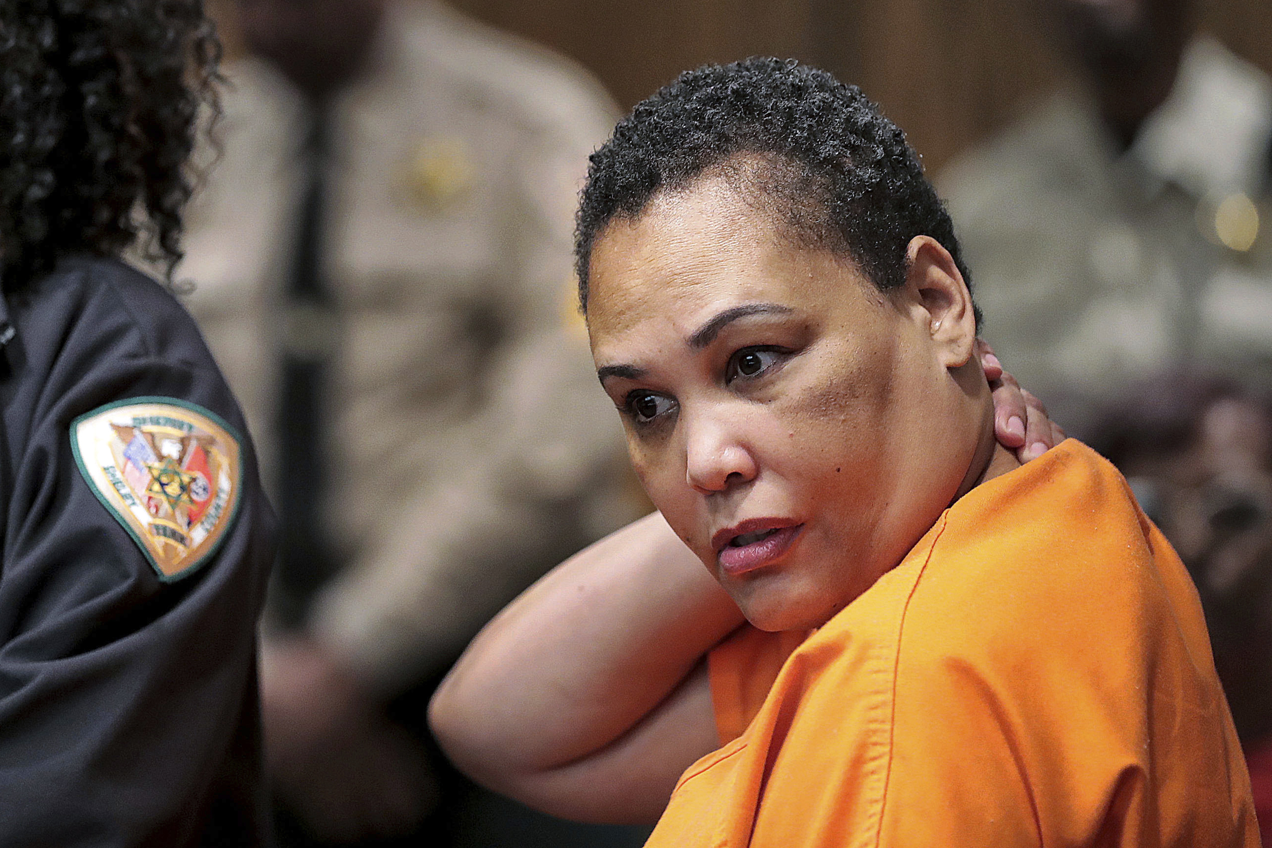 FILE - Sherra Wright listens as prosecutor Paul Hagerman reads a list of evidence against her during a hearing in Judge Lee Coffee's court in Memphis, Tenn., on July 25, 2019.  Lorenzen Wright's ex-wife Sherra Wright should not be granted early release from a 30-year prison sentence she received after pleading guilty to plotting the retired NBA player's 2010 slaying, a Tennessee Board of Parole member said Wednesday, May 11, 2022. 