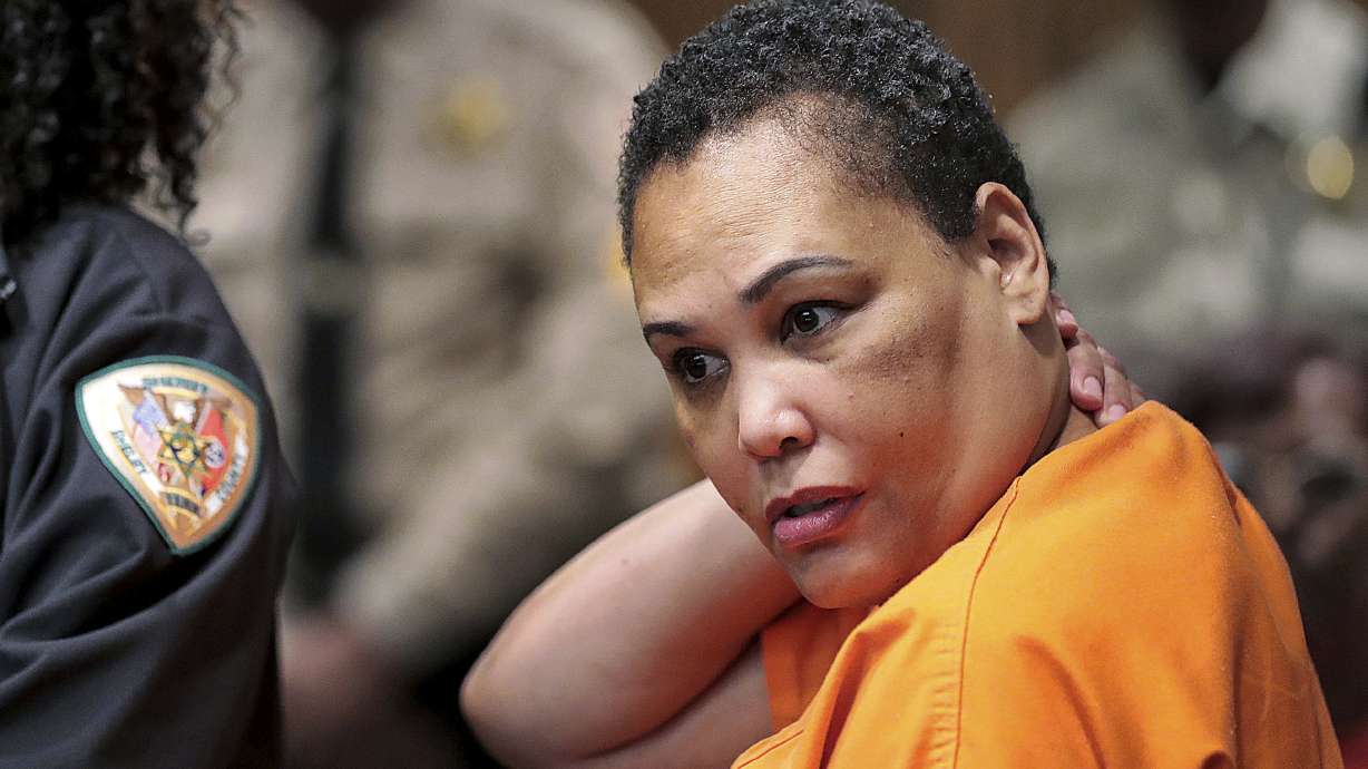 FILE - Sherra Wright listens as prosecutor Paul Hagerman reads a list of evidence against her during a hearing in Judge Lee Coffee's court in Memphis, Tenn., on July 25, 2019. Lorenzen Wright's ex-wife Sherra Wright should not be granted early release from a 30-year prison sentence she received after pleading guilty to plotting the retired NBA player's 2010 slaying, a Tennessee Board of Parole member said Wednesday, May 11, 2022.