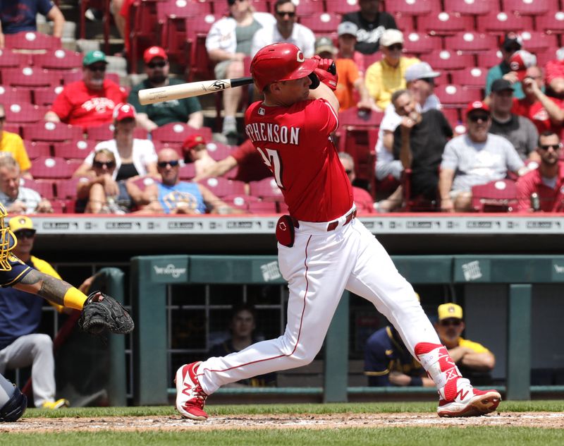 May 11, 2022; Cincinnati, Ohio, USA; Cincinnati Reds designated hitter Tyler Stephenson (37) hits a three-run double against the Milwaukee Brewers during the second inning at Great American Ball Park.