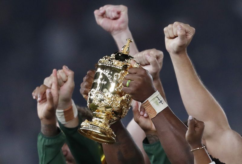 FILE PHOTO: Rugby Union - Rugby World Cup - Final - England v South Africa - International Stadium Yokohama, Yokohama, Japan - November 2, 2019  General view as South Africa's Siya Kolisi celebrates with the Webb Ellis trophy after winning the World Cup Final