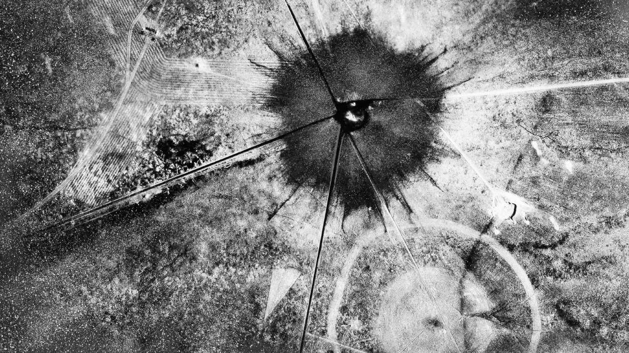 This July 16, 1945, photo, shows an aerial view after the first atomic explosion at Trinity Test Site, N.M. Downwinders, or victims of radiation exposure from aboveground testing of nuclear weapons in Nevada decades ago, may continue to get compensation under a measure passed by both the House and Senate and headed to President Joe Biden’s desk for his signature.