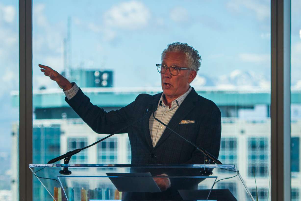 Dee Brewer, the executive director of the Salt Lake City Downtown Alliance, speaks at the Salt Lake City Downtown Alliance "State of Downtown" ceremony at the 95 State building Thursday morning.