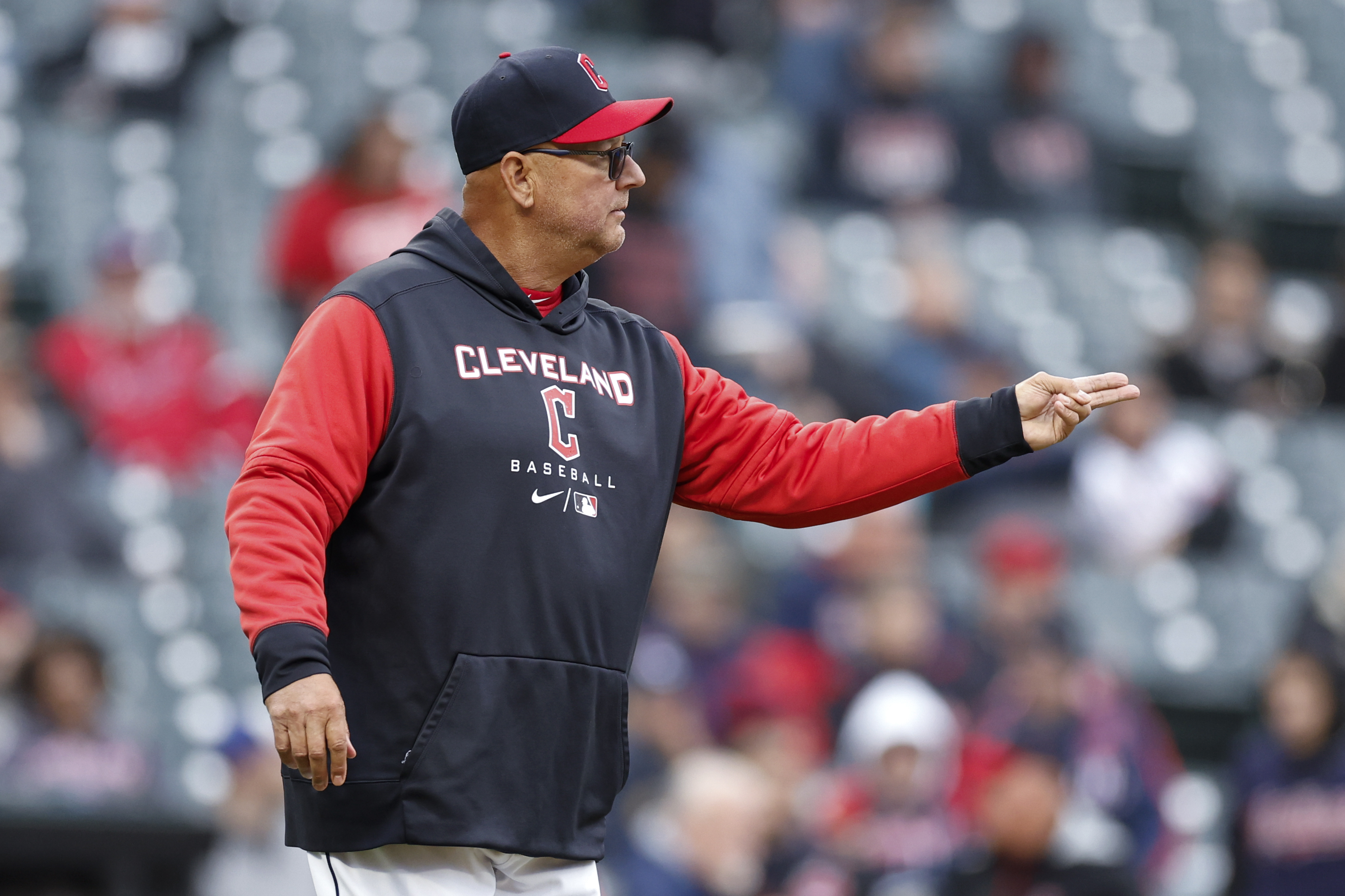 Cleveland Guardians manager Terry Francona calls for a relief pitcher during the fifth inning in the second game of the team's baseball doubleheader against the Chicago White Sox, Wednesday, April 20, 2022, in Cleveland.