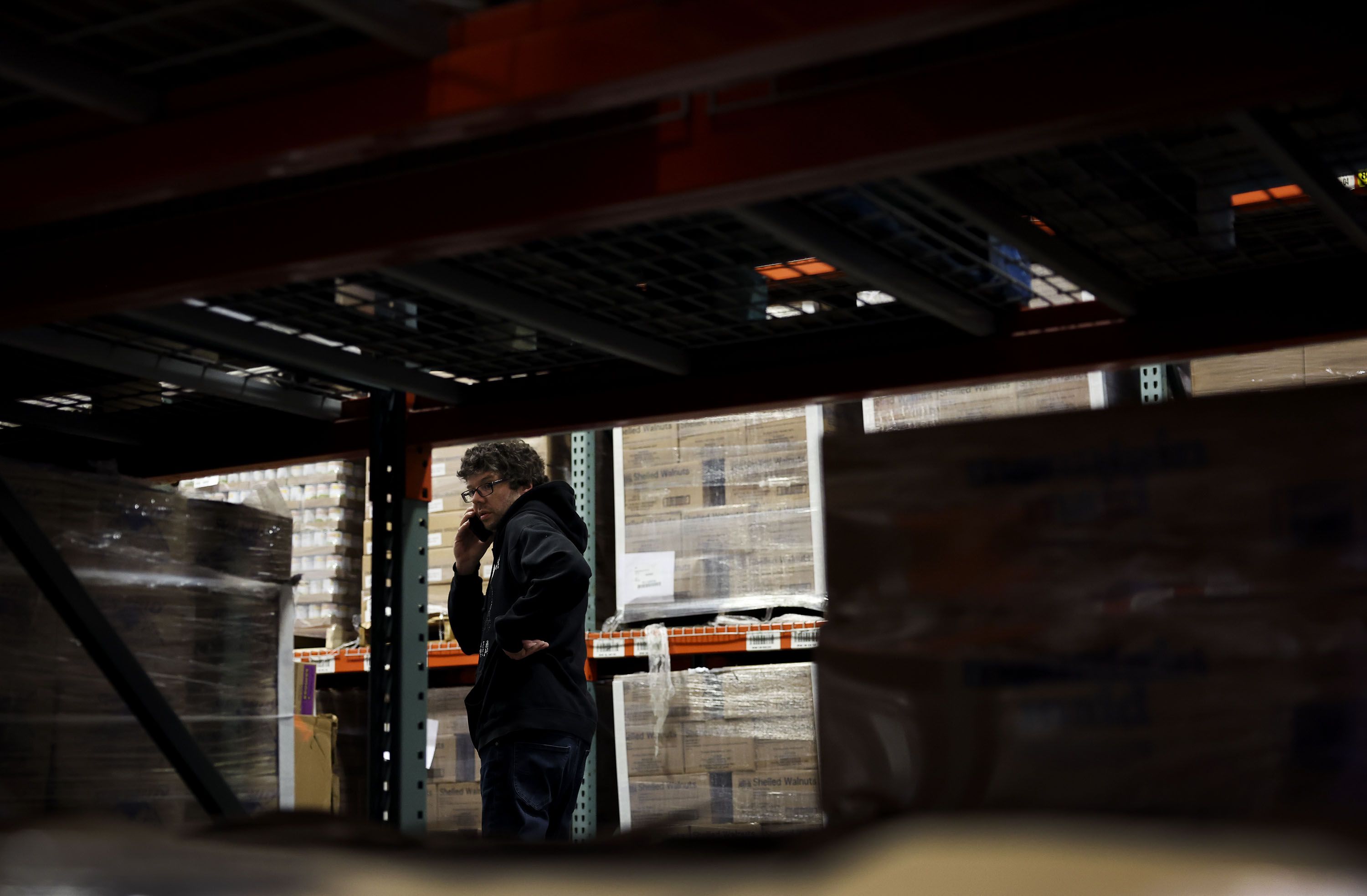 Warehouse employee Adam Waite manages the stocking procedure at the Utah Food Bank in Salt Lake City on May 5.