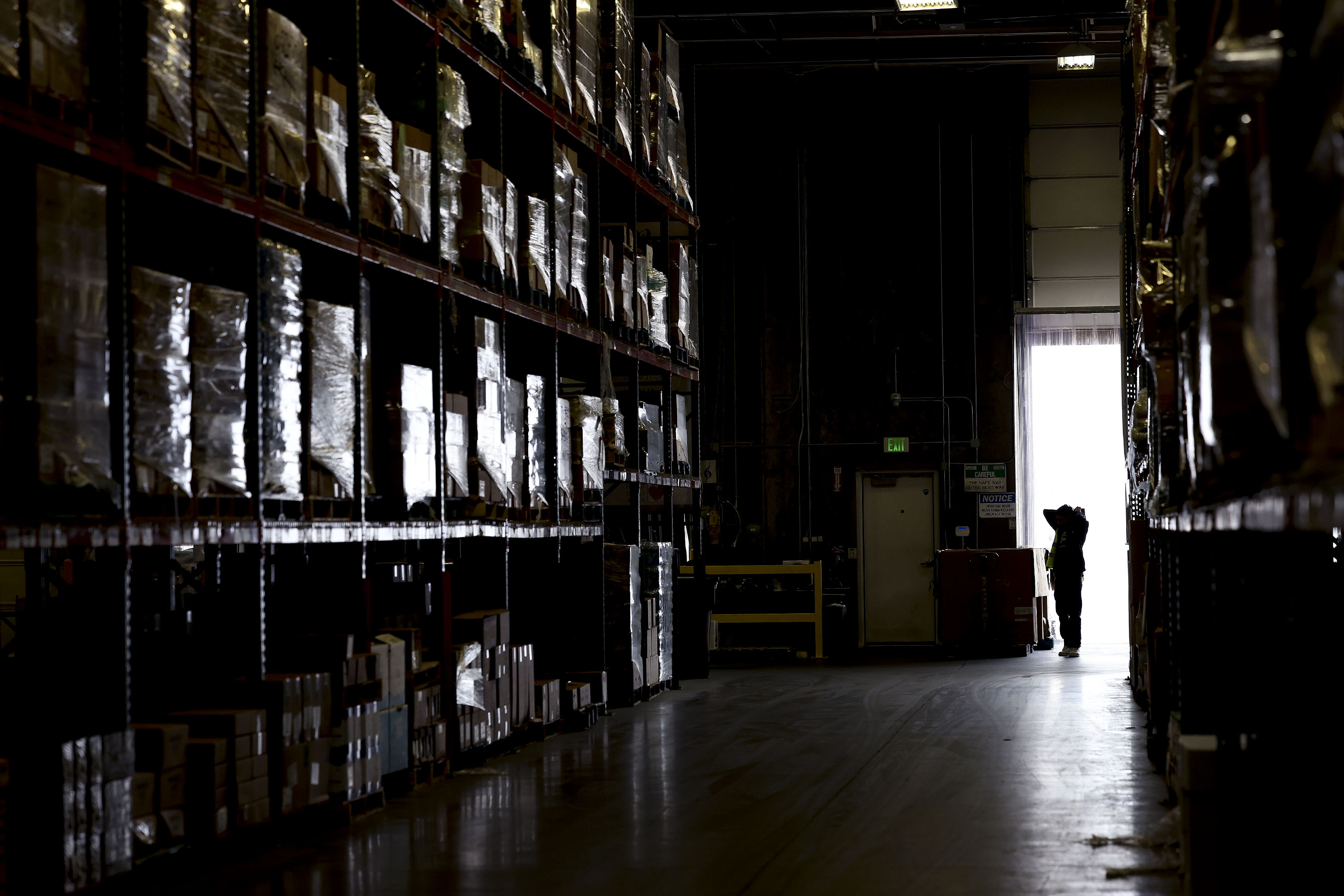 Aisles of food items are pictured at the Utah Food Bank in Salt Lake City on May 5.