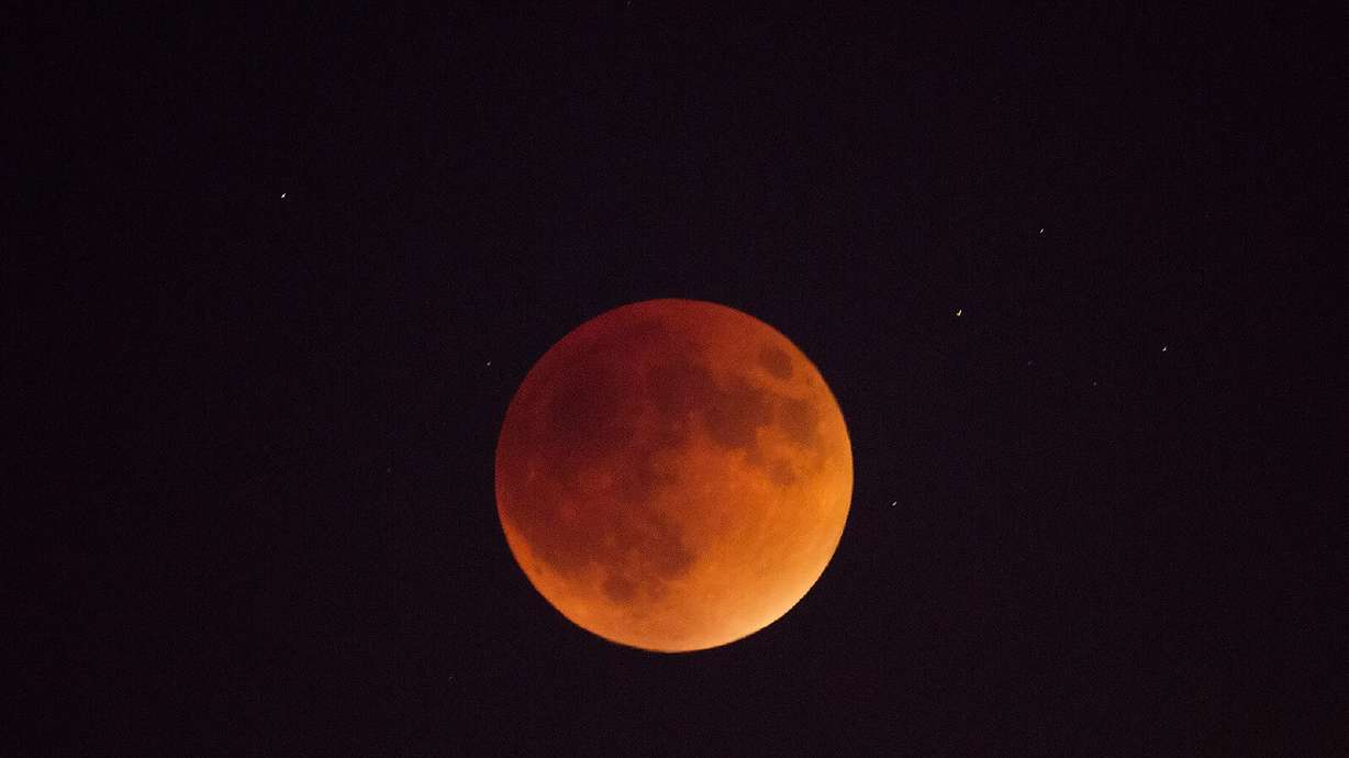 A total lunar eclipse will turn the moon red on Sunday. Here's how to