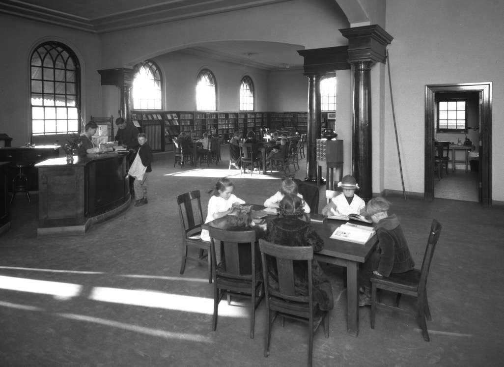 Children read inside the Chapman Library Branch in Salt Lake City on March 8, 1921. The building still serves as a library in the city over a century later.