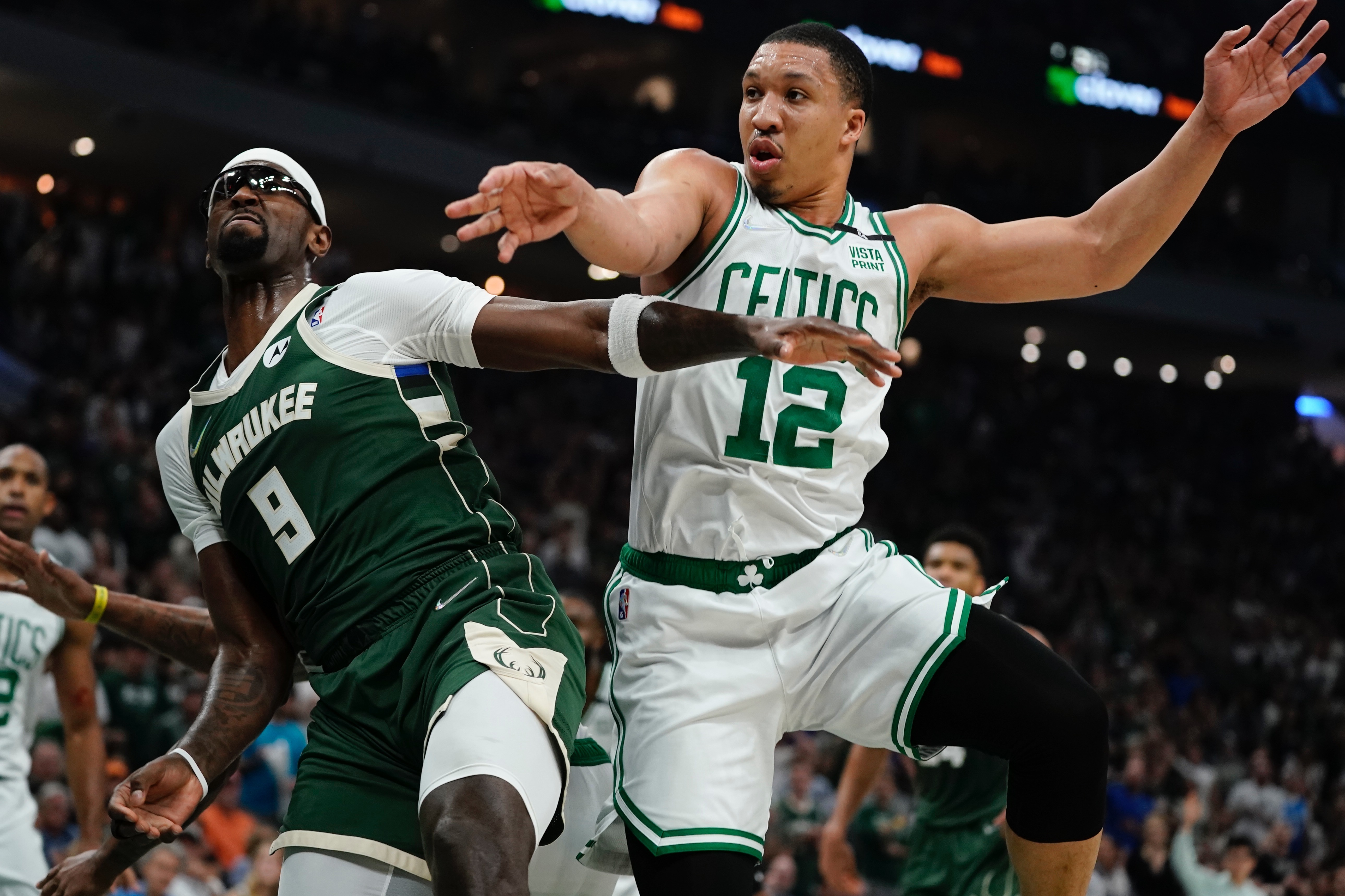 Milwaukee Bucks' Bobby Portis and Boston Celtics' Grant Williams go after a rebound during the first half of Game 6 of an NBA basketball Eastern Conference semifinals playoff series Friday, May 13, 2022, in Milwaukee .