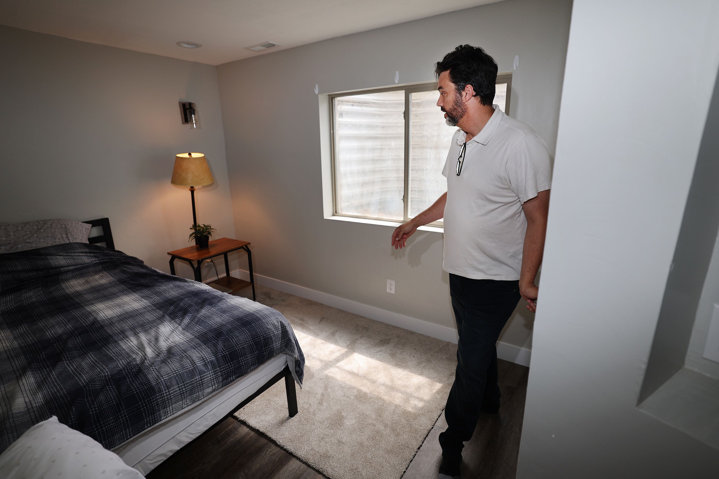 Herriman resident Michael Atkinson, shows his basement apartment on Friday. The apartment will soon house a Ukrainian refugee family.