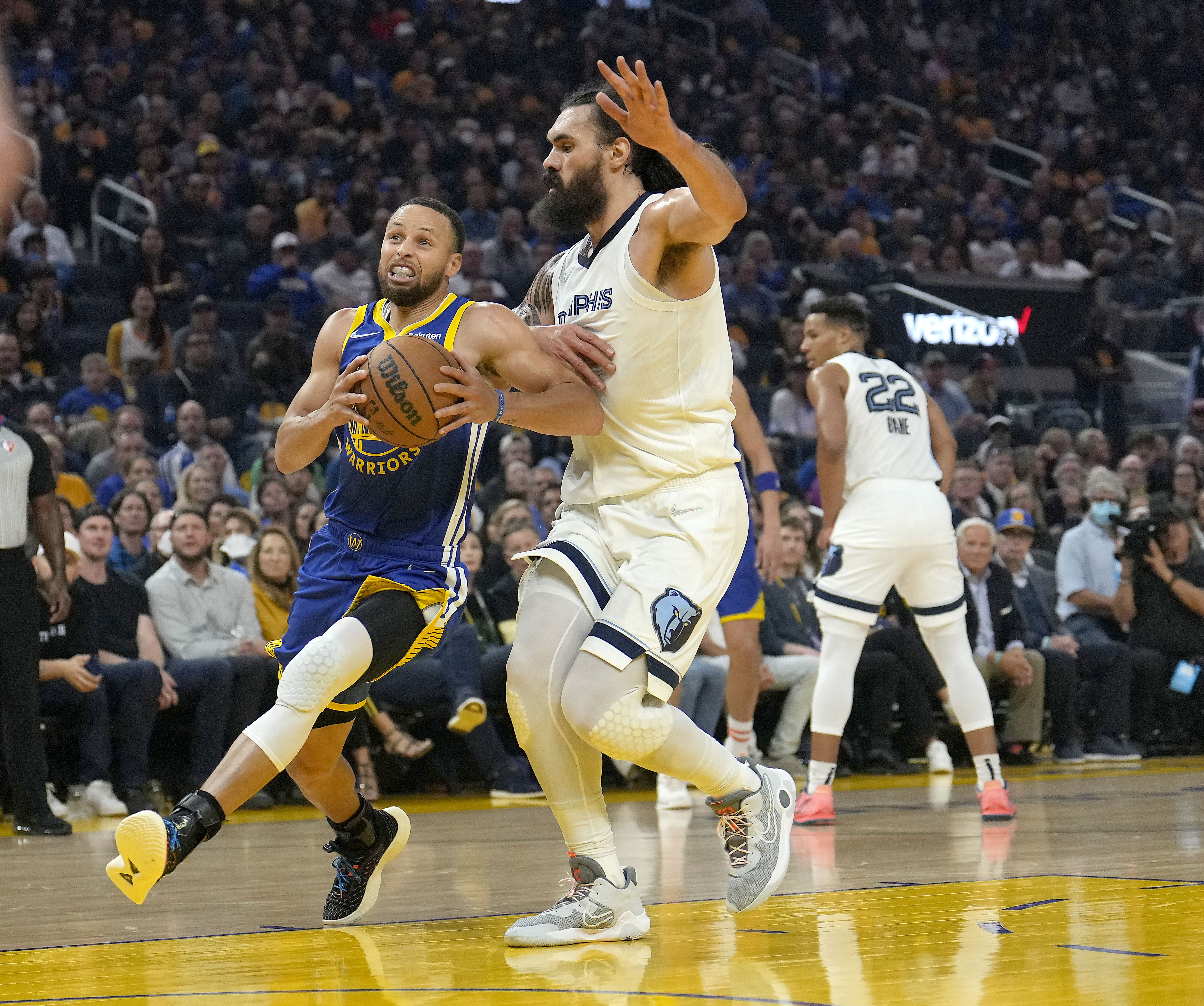 Golden State Warriors guard Stephen Curry drives to the basket against Memphis Grizzlies center Steven Adams during the first half of Game 6 of an NBA basketball Western Conference playoff semifinal in San Francisco, Friday, May 13, 2022. 