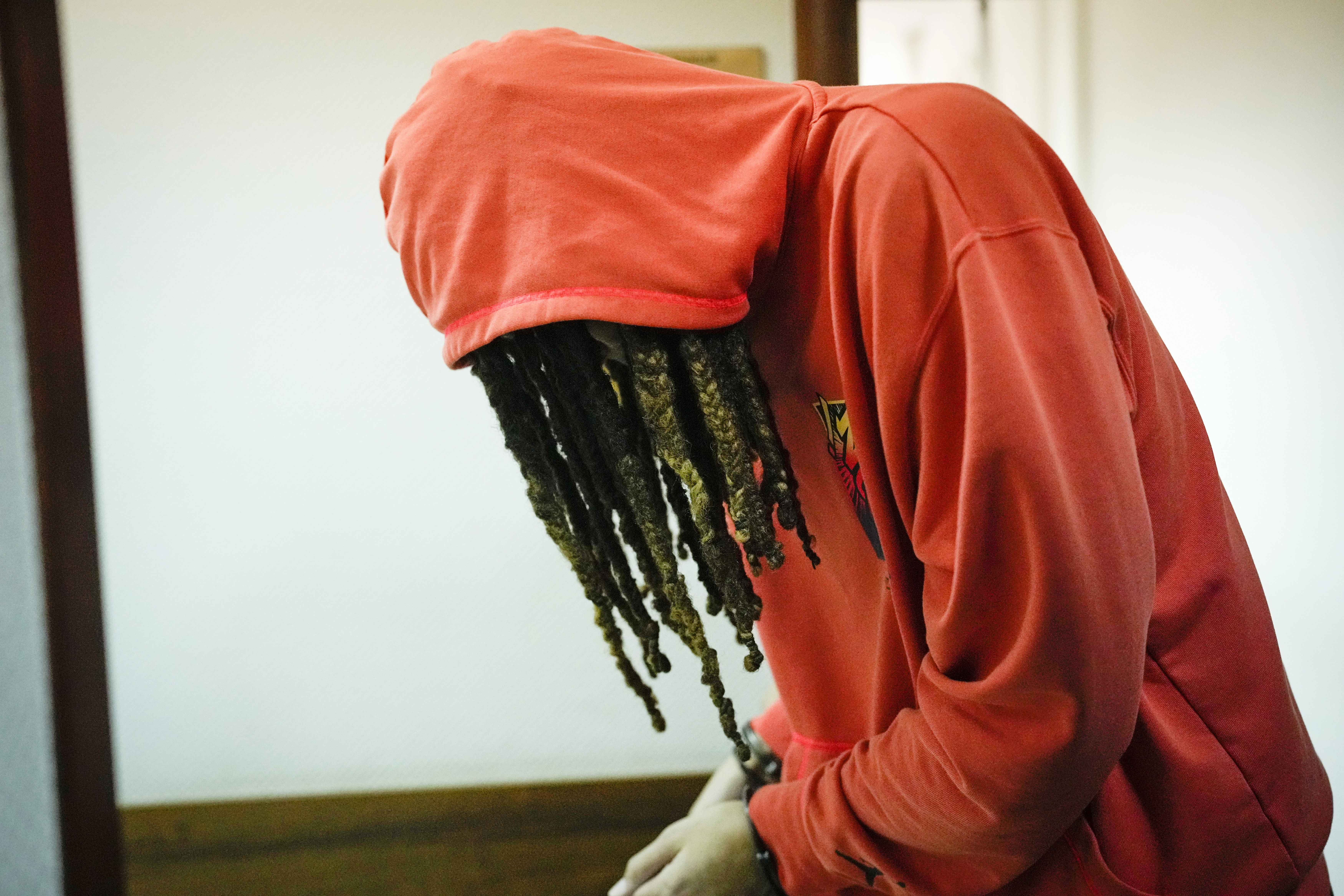 WNBA star and two-time Olympic gold medalist Brittney Griner leaves a courtroom after a hearing, in Khimki just outside Moscow, Russia, Friday, May 13, 2022. Griner, a two-time Olympic gold medalist, was detained at the Moscow airport in February after vape cartridges containing oil derived from cannabis were allegedly found in her luggage, which could carry a maximum penalty of 10 years in prison.  