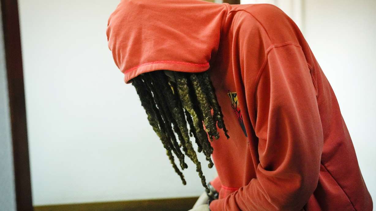 WNBA star and two-time Olympic gold medalist Brittney Griner leaves a courtroom after a hearing, in Khimki just outside Moscow, Russia, Friday, May 13, 2022. Griner, a two-time Olympic gold medalist, was detained at the Moscow airport in February after vape cartridges containing oil derived from cannabis were allegedly found in her luggage, which could carry a maximum penalty of 10 years in prison.
