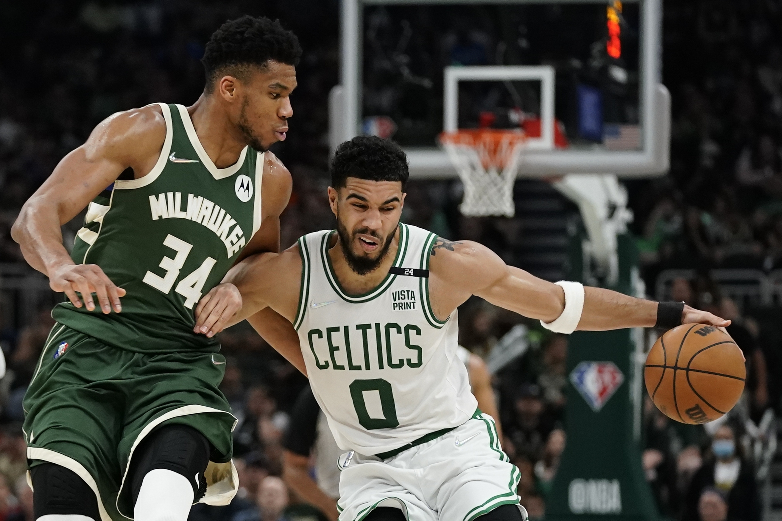 Boston Celtics' Jayson Tatum tries to get past Milwaukee Bucks' Giannis Antetokounmpo during the second half of Game 6 of an NBA basketball Eastern Conference semifinals playoff series Friday, May 13, 2022, in Milwaukee. The Celtics won 108-95 to tie the series at 3-3. 