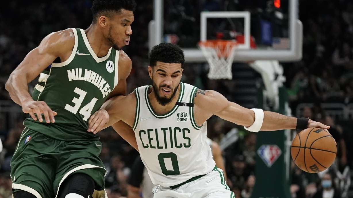 Boston Celtics' Jayson Tatum tries to get past Milwaukee Bucks' Giannis Antetokounmpo during the second half of Game 6 of an NBA basketball Eastern Conference semifinals playoff series Friday, May 13, 2022, in Milwaukee. The Celtics won 108-95 to tie the series at 3-3.