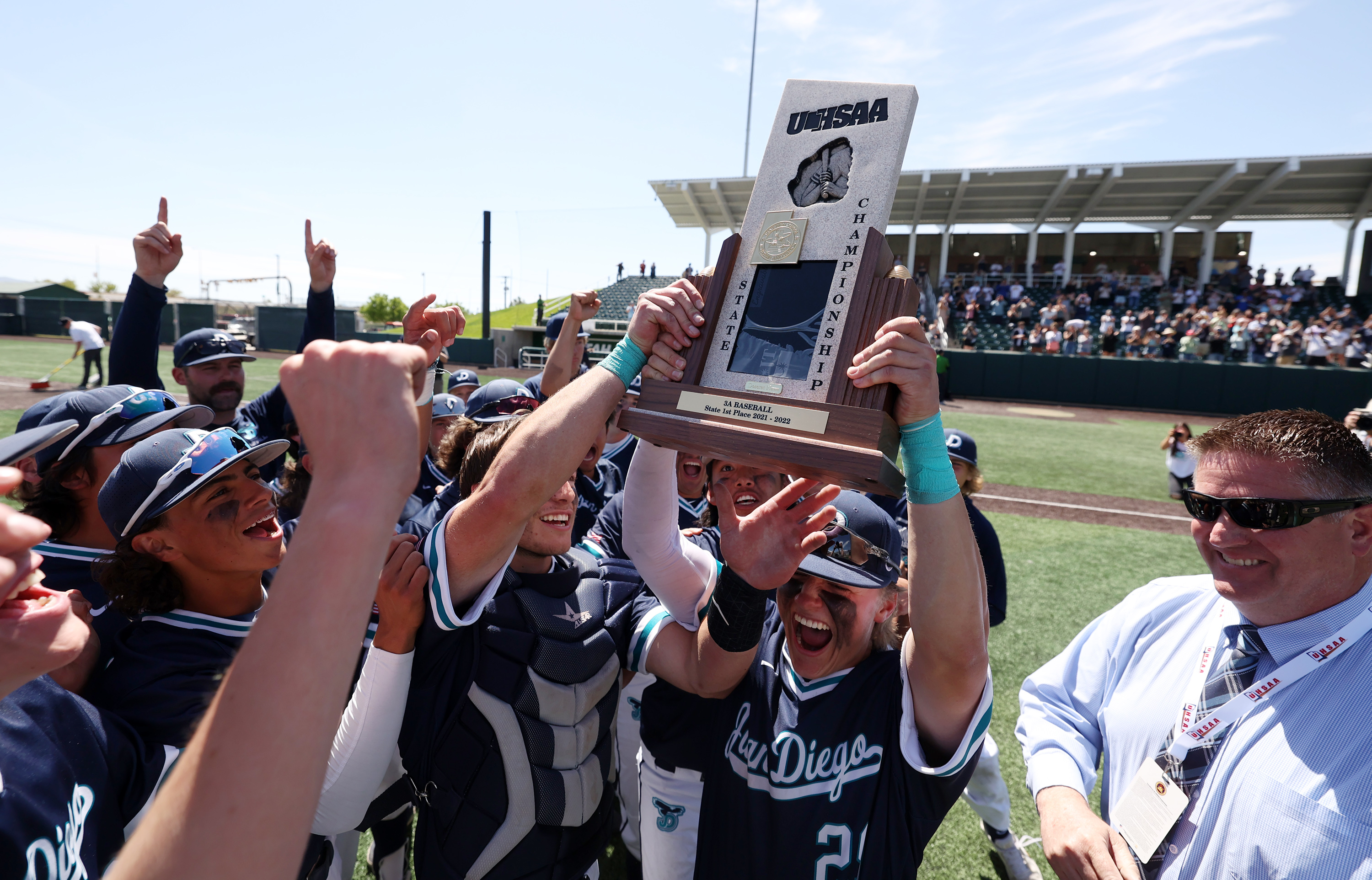 Juan Diego celebrates their win over American Leadership in the 3A State Baseball championship at UVU on Saturday, May 14, 2022. Juan Diego won 8-1.