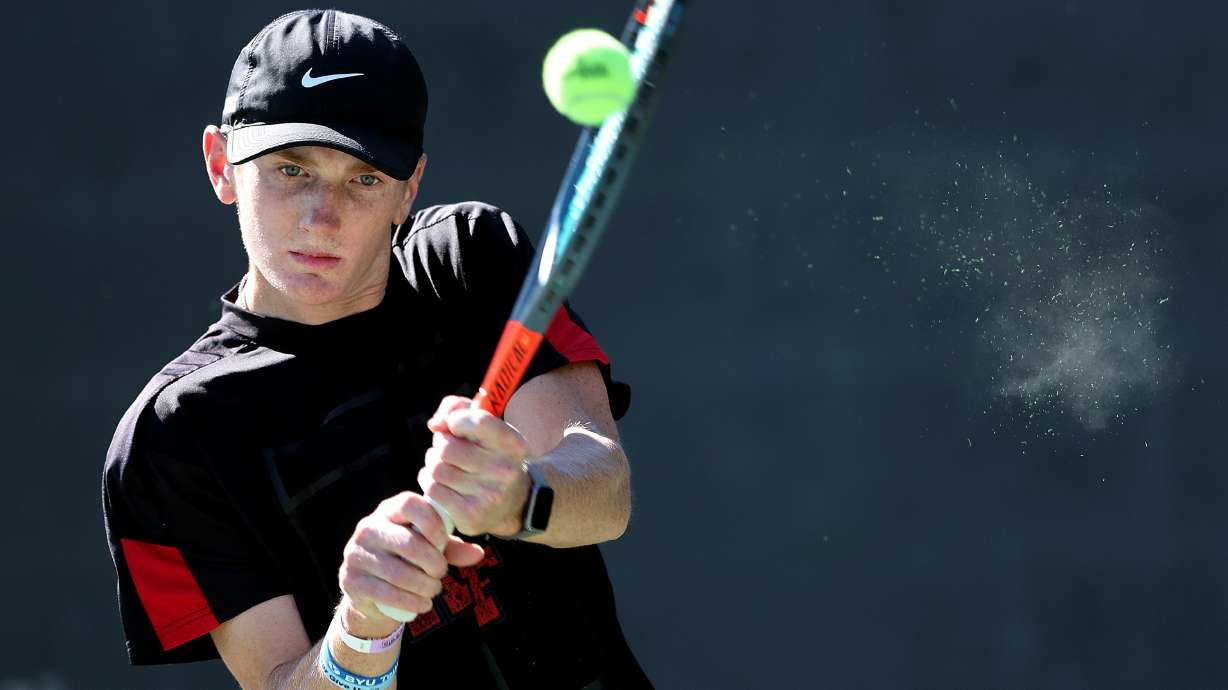 American Fork’s Caden Hasler, returns a ball as high school boys compete in the 6A State Tennis Championships at Liberty Park in Salt Lake City on Saturday, May 14, 2022. Hasler won in first singles.