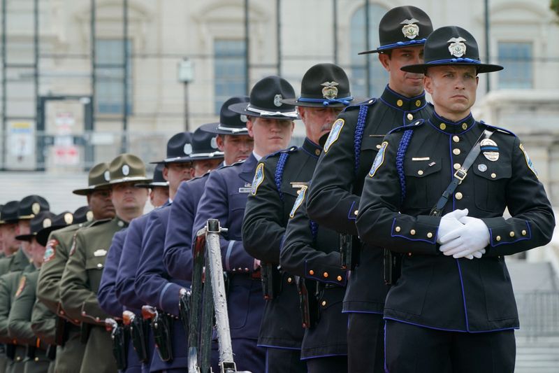 U.S. police honor guard members attend the annual National Peace Officers' Memorial Service at the U.S. Capitol in Washington, U.S. on Sunday.