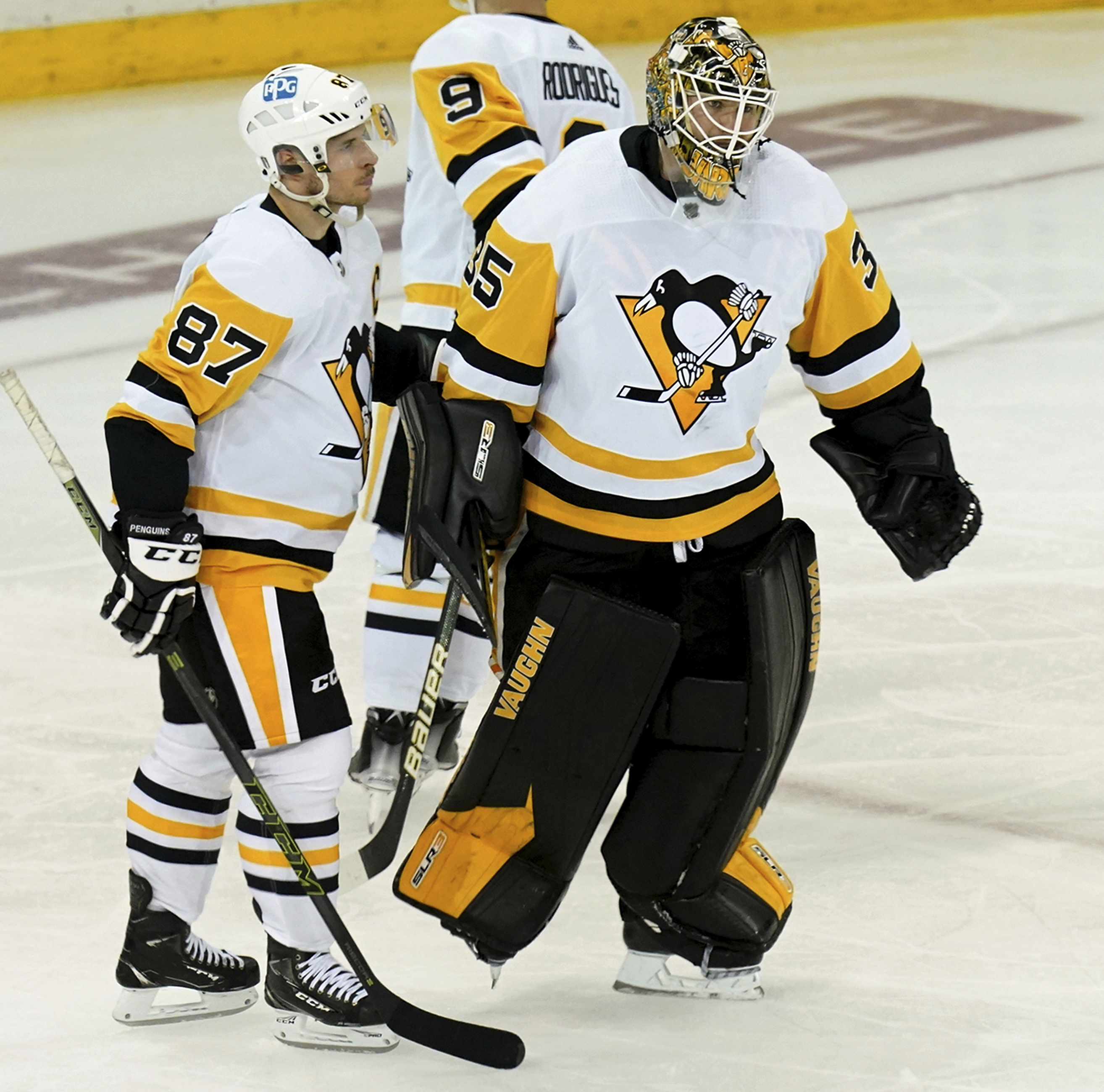 Pittsburgh Penguins center Sidney Crosby and goaltender Tristan Jarry skate off the ice after losing to the New York Rangers in overtime of Game 7 in an NHL hockey playoff series, Sunday, May 15, 2022, at Madison Square Garden in New York.