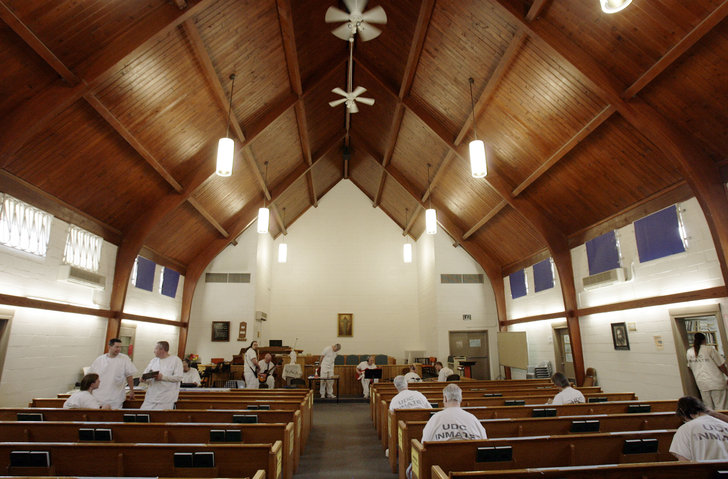 Inmates crochet and practice music in a worship chapel at the Utah State Prison in Salt Lake County on March 31, 2011.
