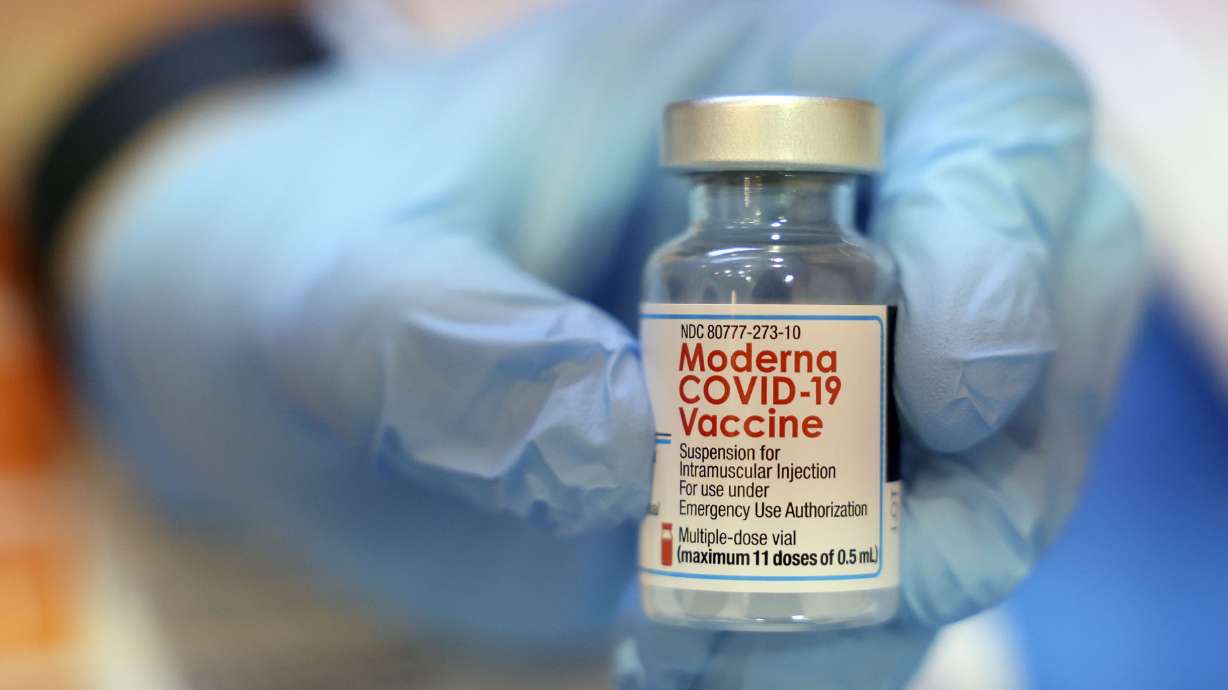 A bottle of Moderna COVID-19 vaccine is pictured at a vaccine clinic in Salt Lake City on Jan. 20. On Thursday, Utah health officials reported 4,504 new COVID-19 cases and four additional deaths over the past seven days as the state continues to see a spike.