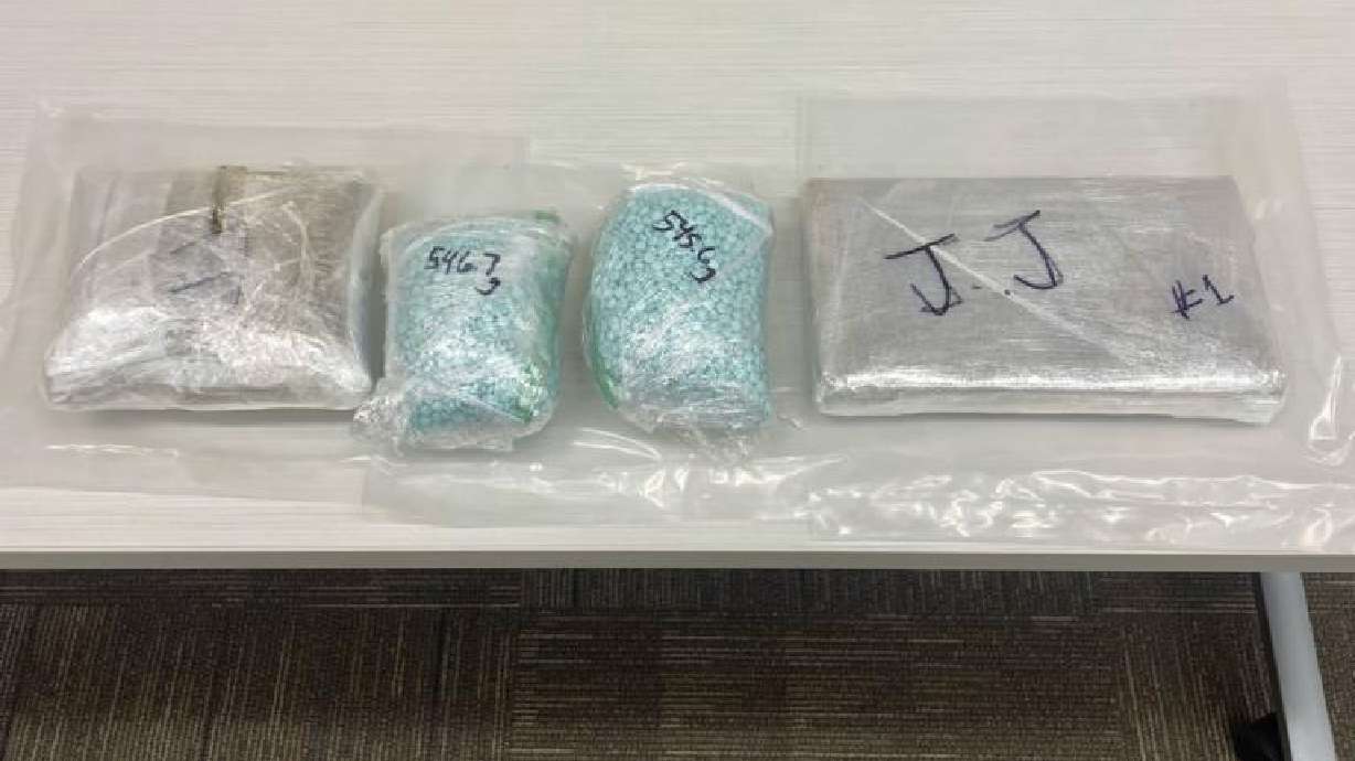 More than 2 pounds each of suspected cocaine, fentanyl pills and heroin were seized during a traffic stop in Washington, May 11.