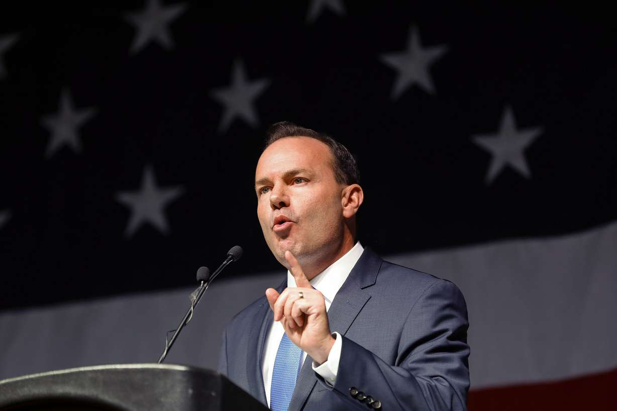 Sen. Mike Lee speaks to delegates at the GOP State Convention at the Mountain America Exposition Center in Sandy on April 23.