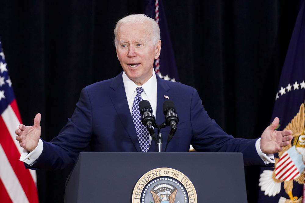 President Joe Biden speaks at the Delavan Grider Community Center in Buffalo, N.Y., Tuesday, following Saturday's shooting at a supermarket. Biden on Tuesday condemned the poison of white supremacy and said the nation must "reject the lie" of the racist "replacement theory" espoused by the shooter who killed 10 Black people in Buffalo.