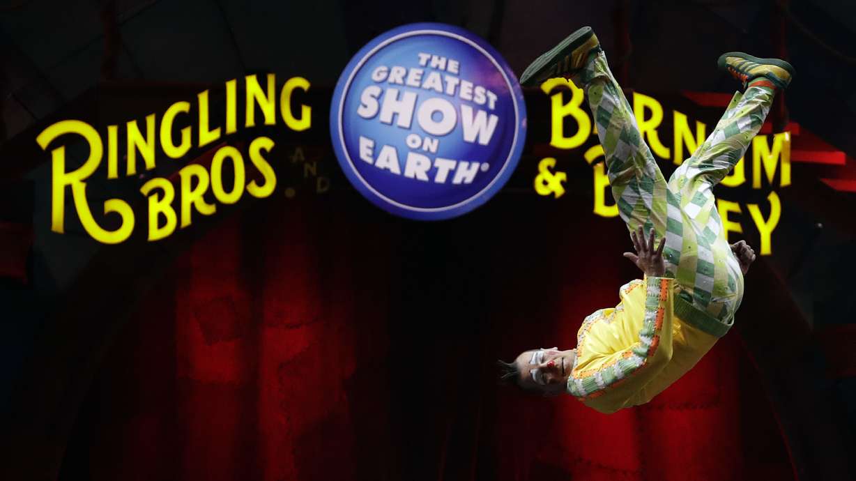 A Ringling Bros. and Barnum & Bailey clown does a somersault during a performance Jan. 14, 2017, in Orlando, Fla. “The Greatest Show on Earth” is making a comeback — without animal acts — five years after shutting down its three-ring circus, the company announced Wednesday.