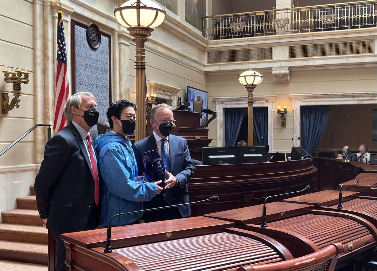 Utah Sports Commission CEO Jeff Robbins and senate president Stuart Adams award a special designation to Olympic gold medalist and Salt Lake City native Nathan Chen proclaiming Wednesday, May 18, 2022 as "Nathan Chen Day," in Salt Lake City.