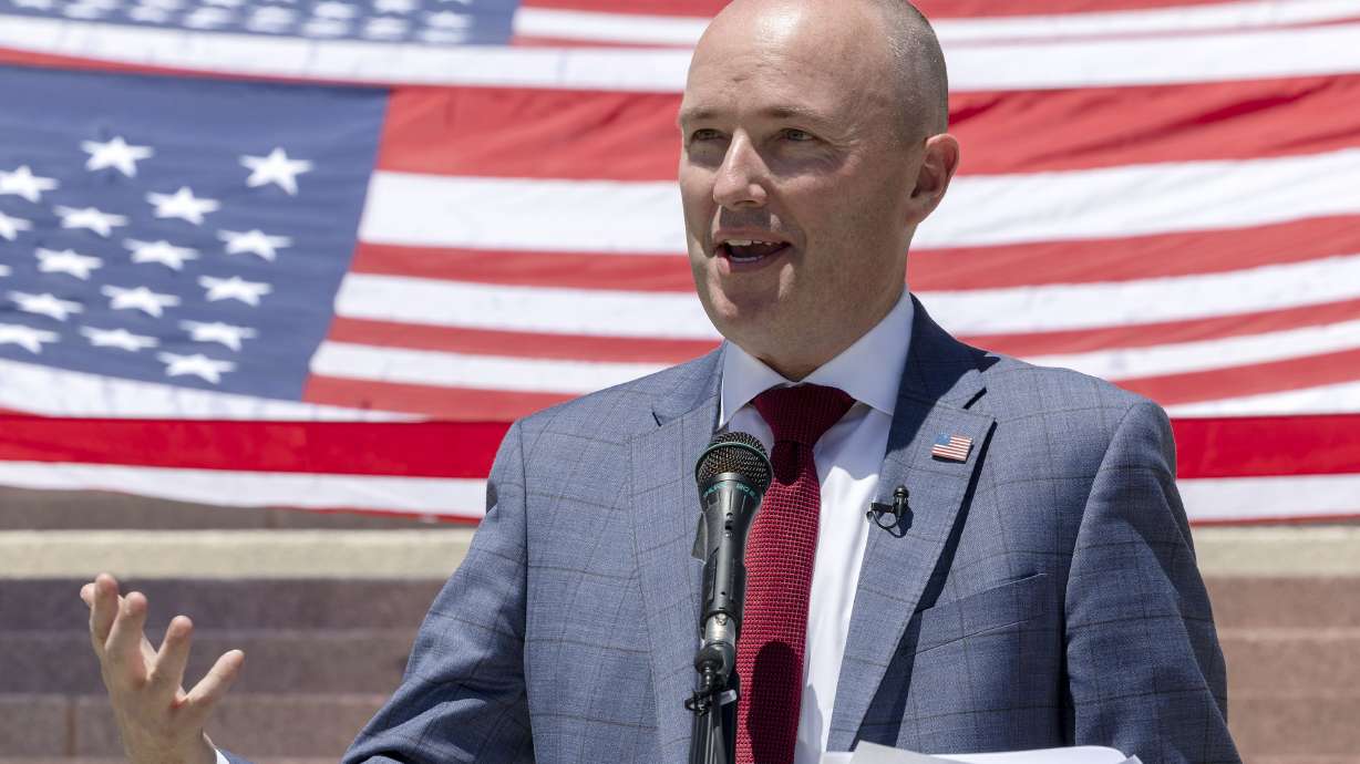Gov. Spencer Cox speaks prior to placing a new 100-year time capsule in a column of the Capitol in Salt Lake City on Wednesday.