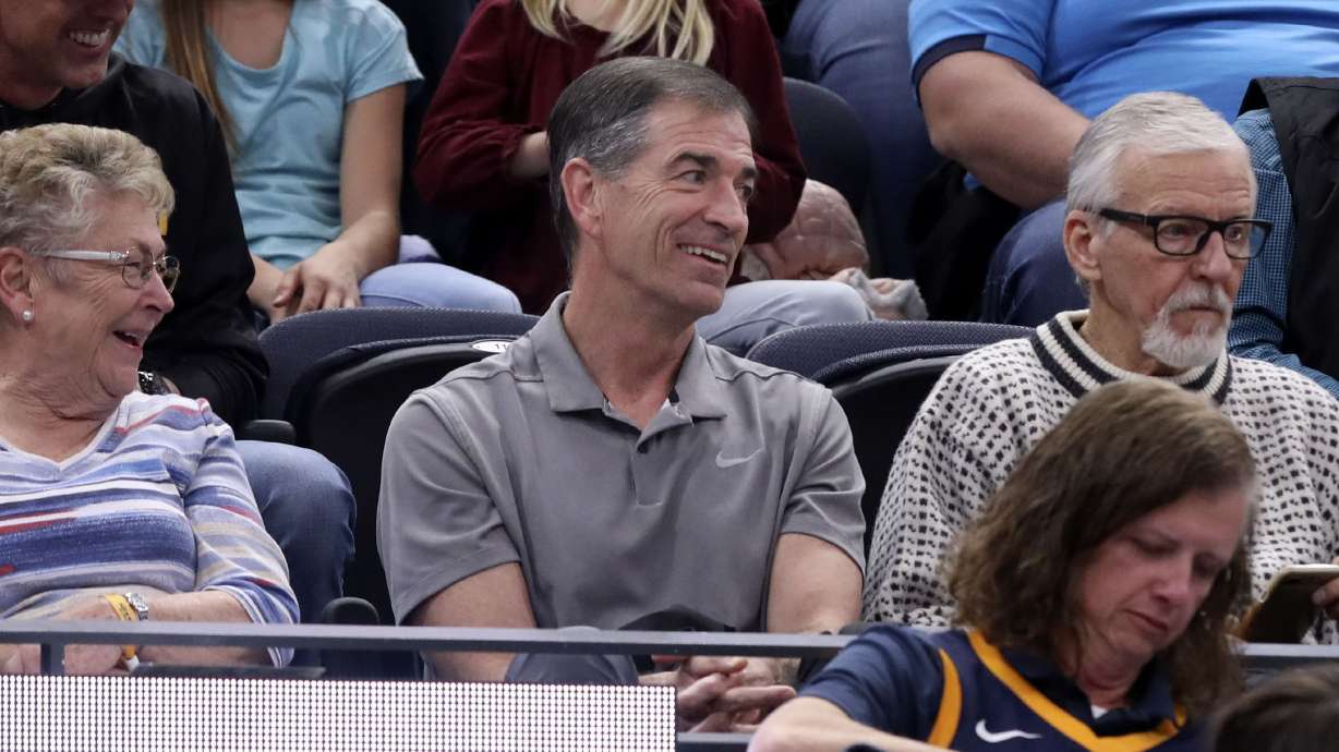 Retired Utah Jazz star John Stockton, center, wrote a letter of support for a Kaysville woman who pleaded guilty to participating in the Jan. 6 U.S. Capitol riot.