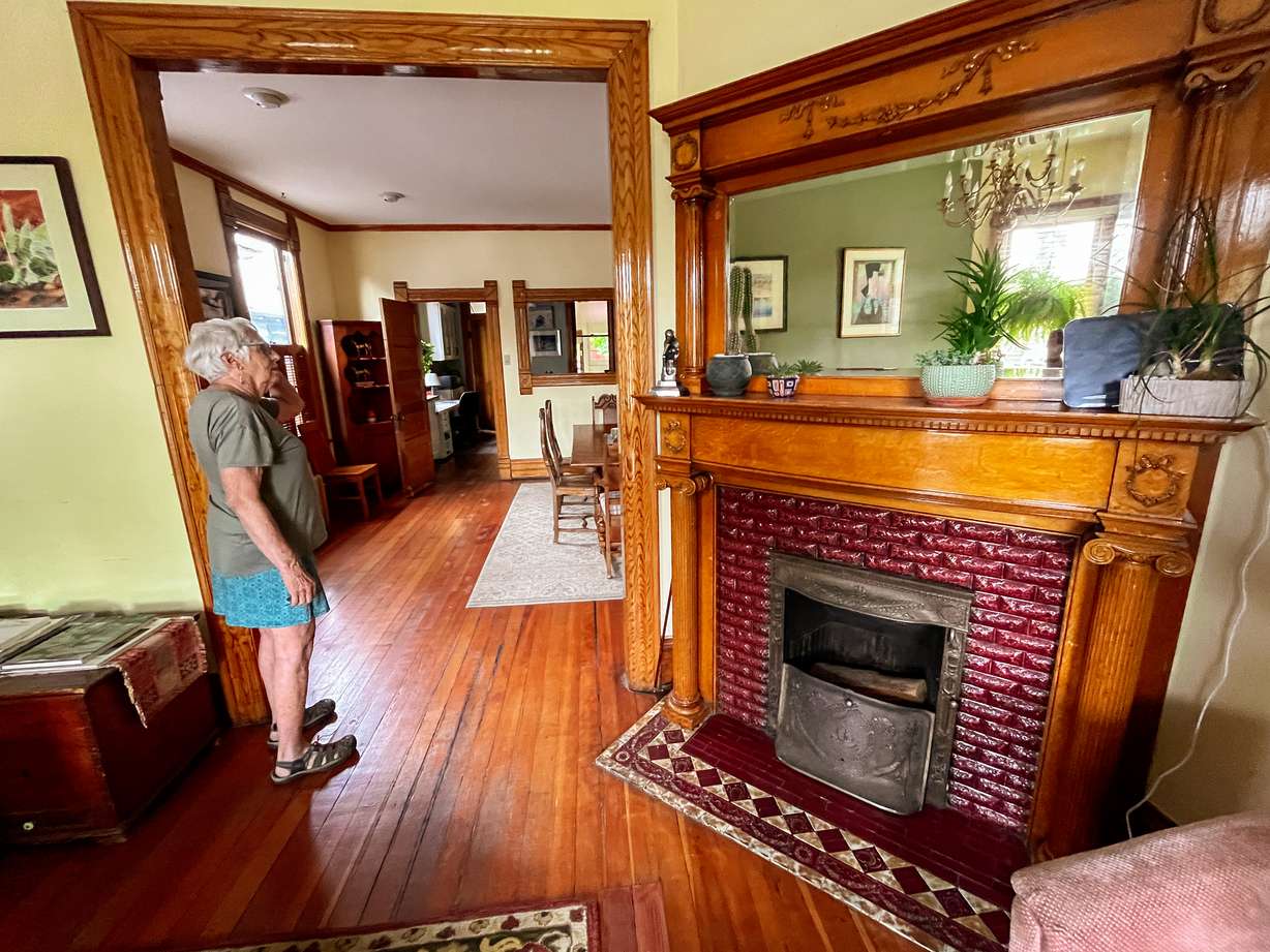 Marita Hart offers a tour of the historic home she and her husband, Bernie, live in within Salt Lake City's Central City neighborhood Tuesday. It is one of a few historic homes in the area that people will be able to tour for Saturday's Historic Homes Tour.