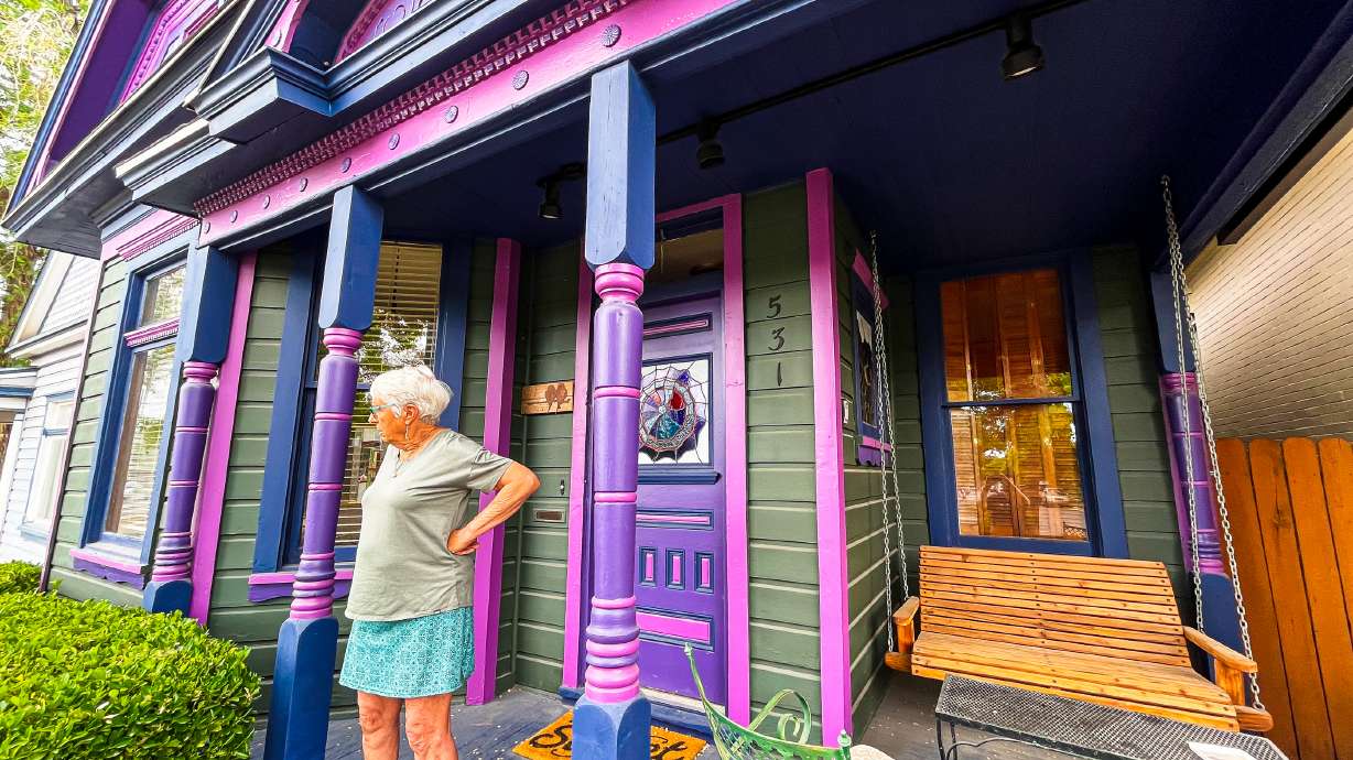 Marita Hart stands outside of the historic home she and her husband, Bernie, live in within Salt Lake City's Central City neighborhood Tuesday. It is one of a few historic homes in the area that people will be able to tour for Saturday's Historic Homes Tour.