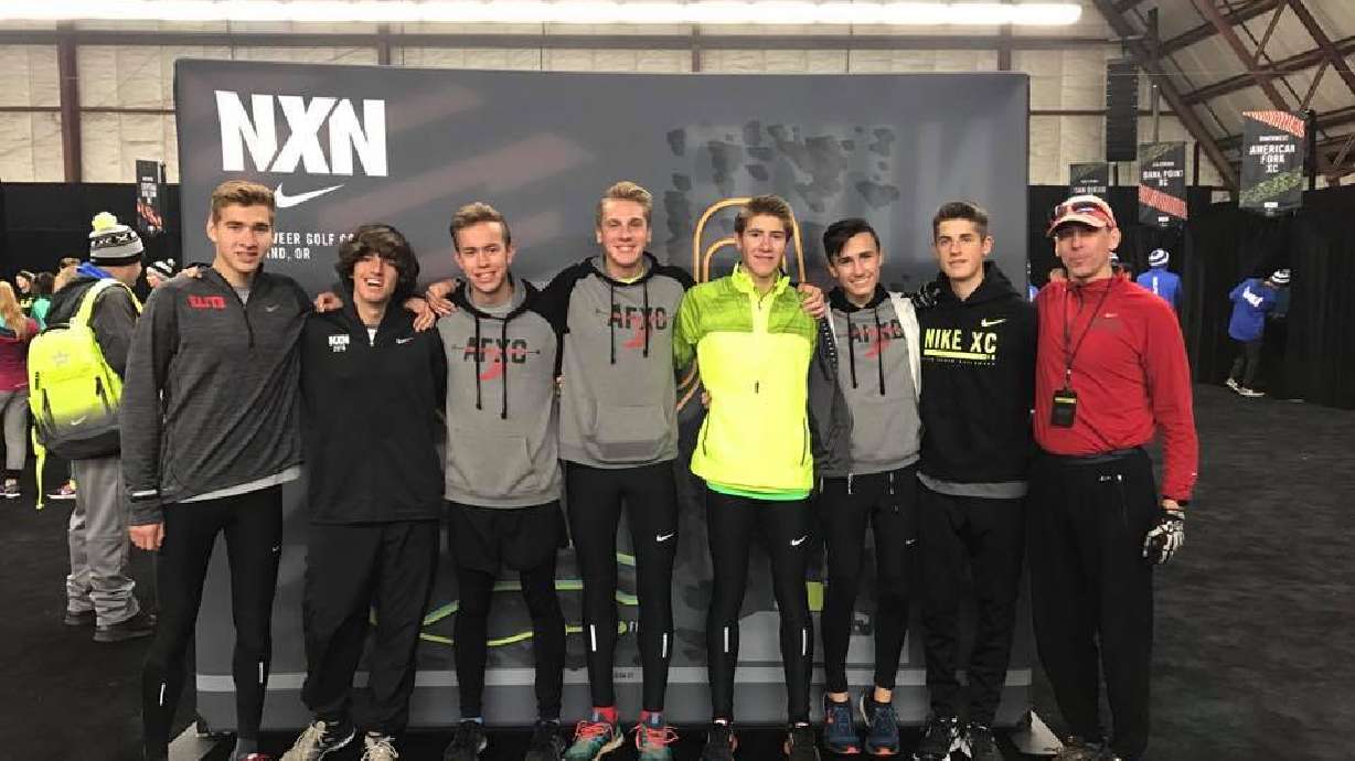 The American Fork Cross Country team and head coach Timo Mostert (far right) at the Nike National Cross Country Championships on Dec. 6, 2016. The Cavemen finished second in the nation.