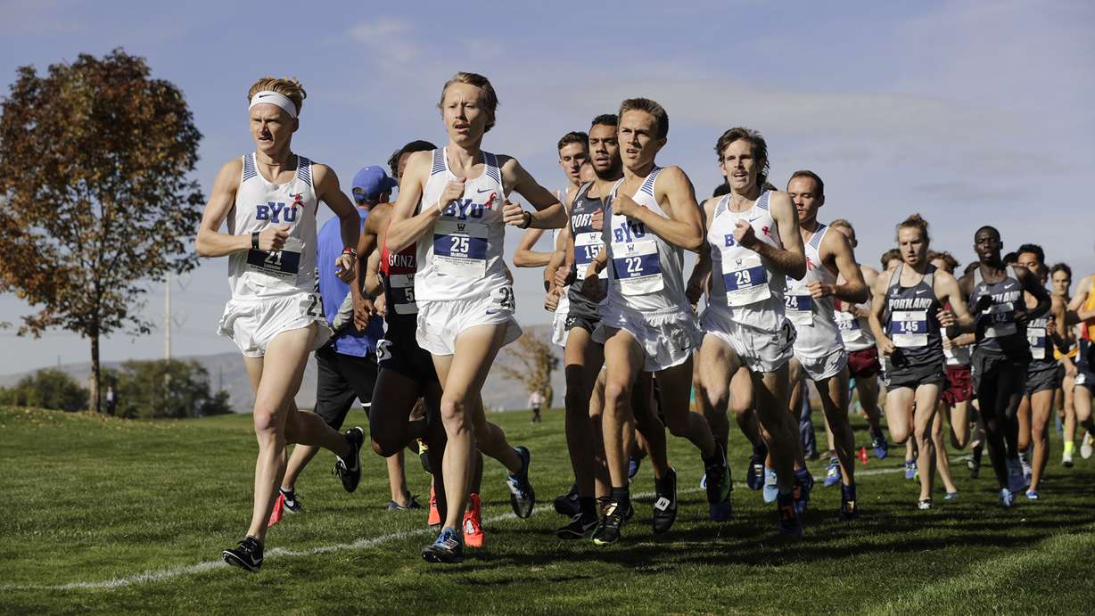 BYU's Rory Linkletter (left), Connor McMillan (center) and Conner Mantz (right) lead the pack early in the men's 8k at the 2018 WCC Championships.