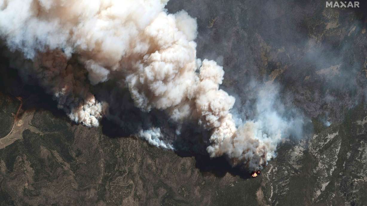 This satellite image shows the active fire lines of the Hermits Peak wildfire, in Las Vegas, N.M., May 11. More than 5,000 firefighters are battling multiple wildland blazes in dry, windy weather across the Southwest. Evacuation orders remained in place Thursday, for residents near fires in Texas, Colorado and New Mexico.