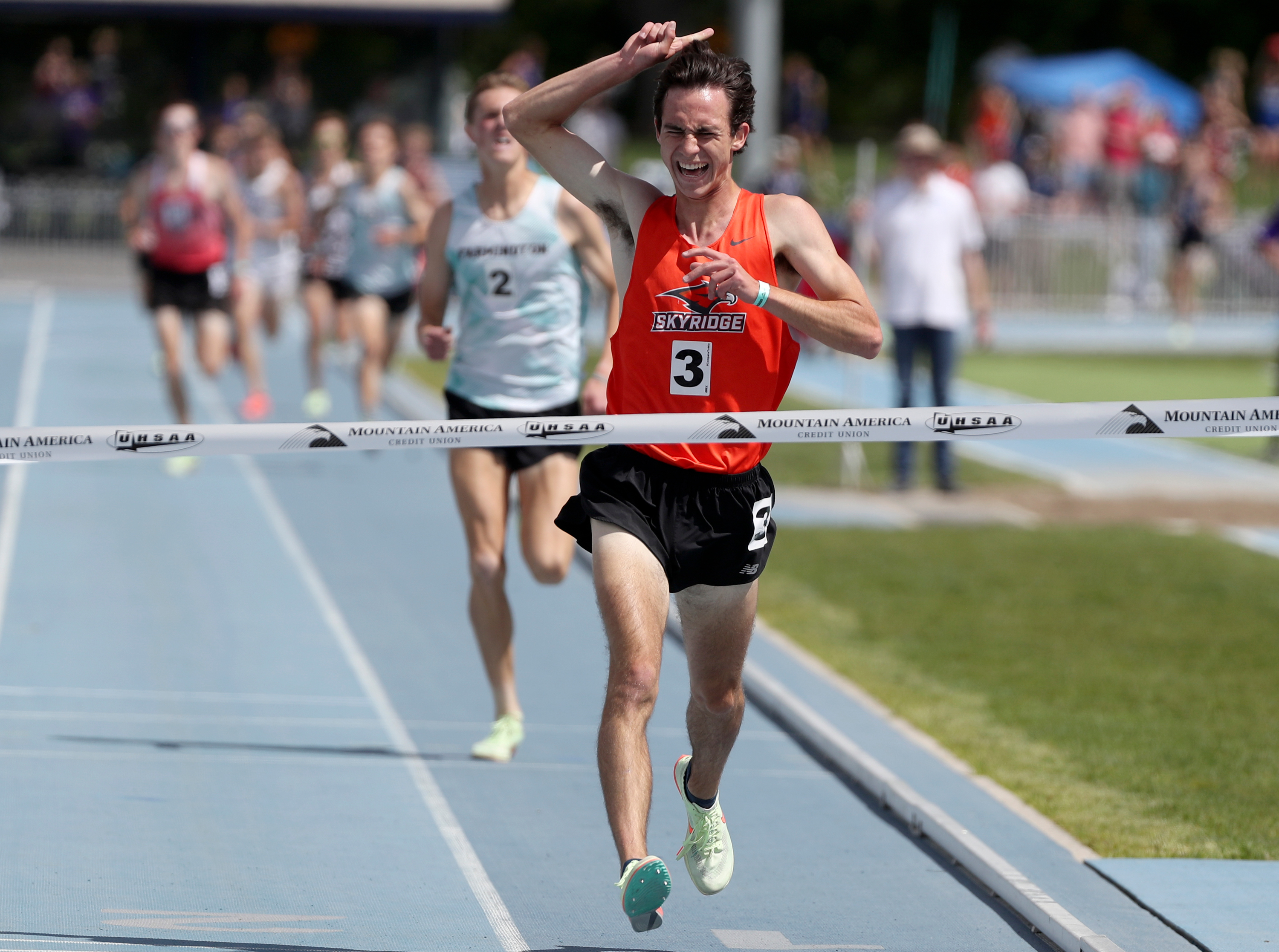 Skyridge High’s Seth Wallgren wins the boys 3200 meter race at the 6A track state championships at the Clarence F. Robison Outdoor Track and Field Complex in Provo on Thursday, May 19, 2022.