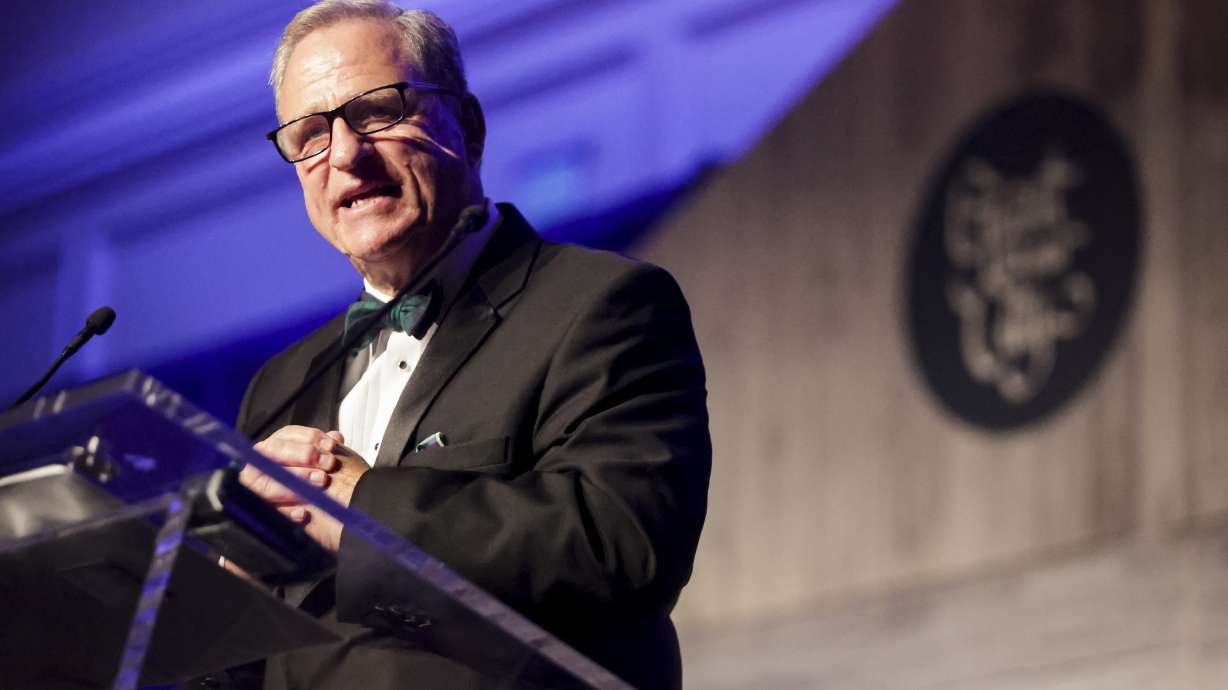 Ray Pickup, former CEO of WCF Insurance, speaks as he is honored with the 43rd Giant in Our City award during the Salt Lake Chamber Annual Award banquet in Salt Lake City, Utah on Thursday. The award is given to an individual who showcases exceptional and distinguished service and who has reached extraordinary professional achievement.