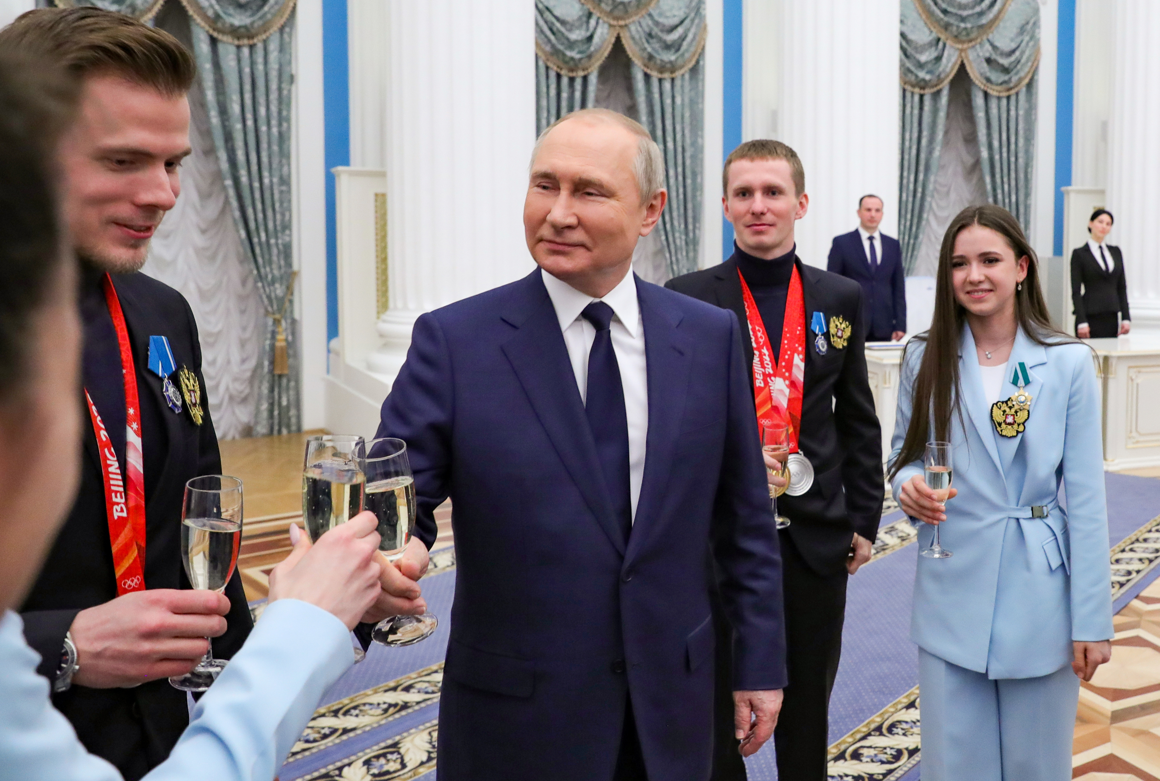 Russian President Vladimir Putin meets with Russian athletes during an awarding ceremony for the Russian Olympic Committee's medalists of the XXIV Olympic Winter Games in Beijing and members of the Russian Paralympic team in the Kremlin in Moscow, Russia, Tuesday, April 26, 2022. 