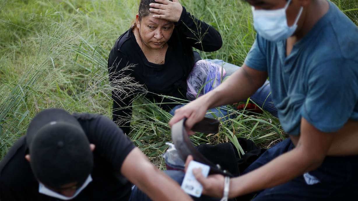 Undocumented immigrants are detained by Border Patrol agents near McAllen, Texas, on June 22, 2021. Repealing Title 42, the controversial public health policy that allows Customs and Border Protection officers to turn away migrants trying to apply for asylum, is a “mistake,” Utah Gov. Spencer Cox said Thursday.