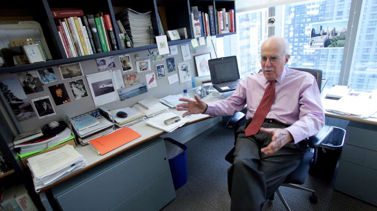 FILE - Author Roger Angell gestures during an interview at his office at the New Yorker magazine on April 4, 2006, in New York. Angell, a longtime New Yorker writer and editor, has died the New Yorker announced Friday, May 20, 2022. He was 101. Angell, the son of founding New Yorker editor Katharine White and stepson of E.B. White, contributed hundreds of essays and stories to the magazine over a 70-year career.