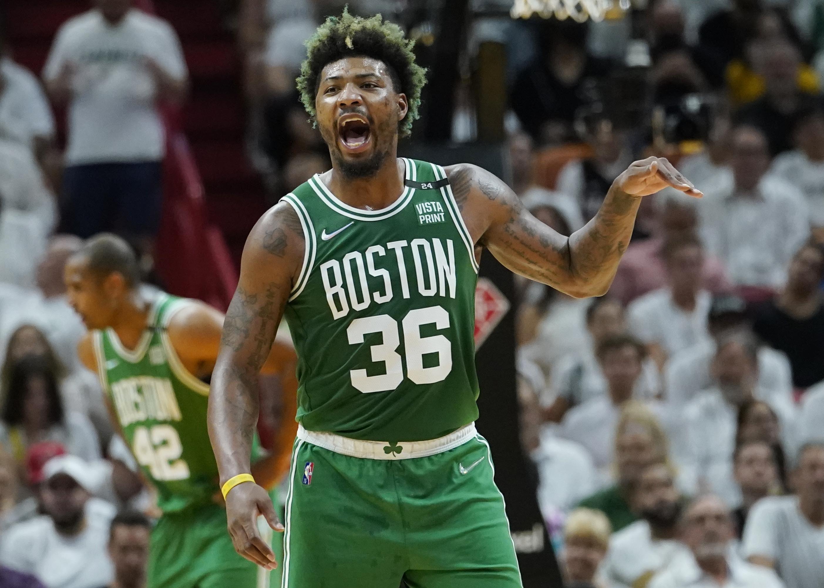 Boston Celtics guard Marcus Smart (36) gestures during the first half of Game 2 of the NBA basketball Eastern Conference finals playoff series against the Miami Heat, Thursday, May 19, 2022, in Miami. 